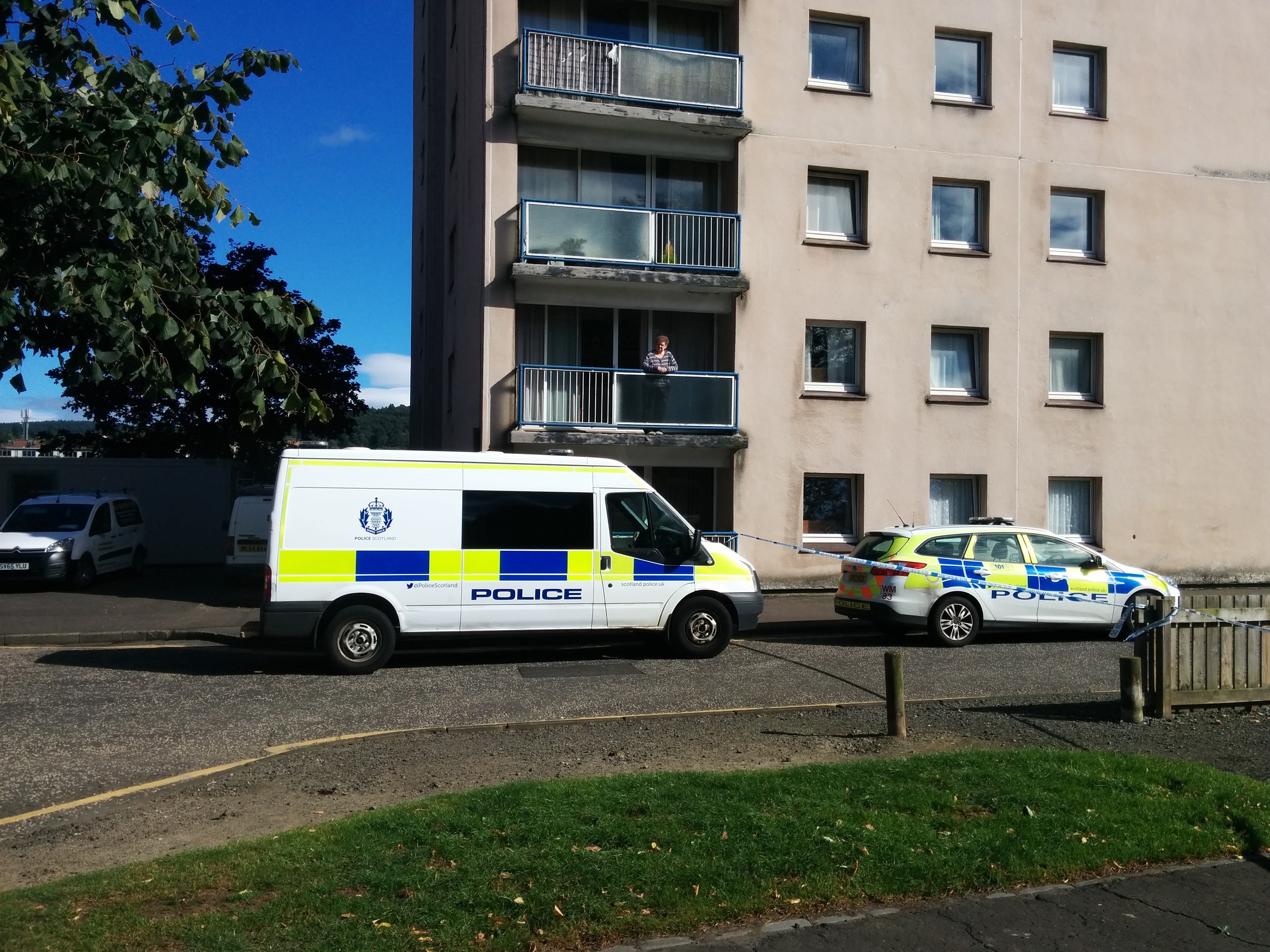 Police at the Pomarium flats.