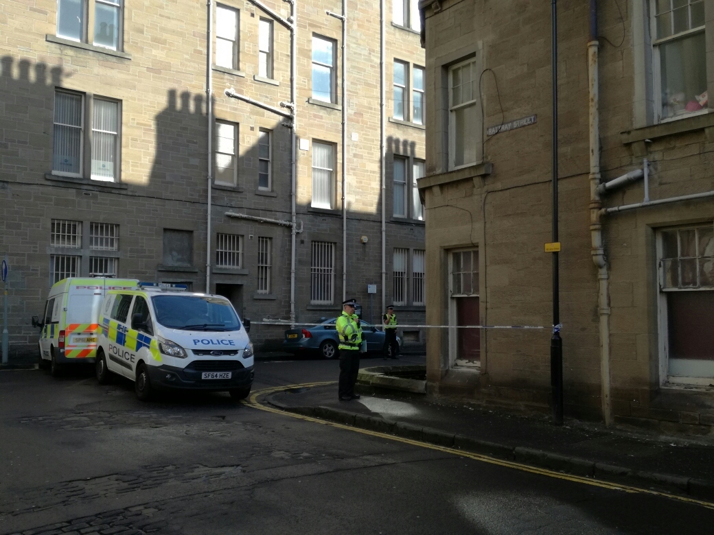 Police in Forester Street after Steven Smeaton's body was found.