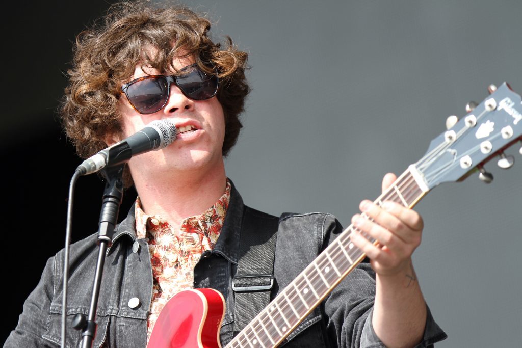 Kyle Falconer on stage with The View during T in the Park 2013.