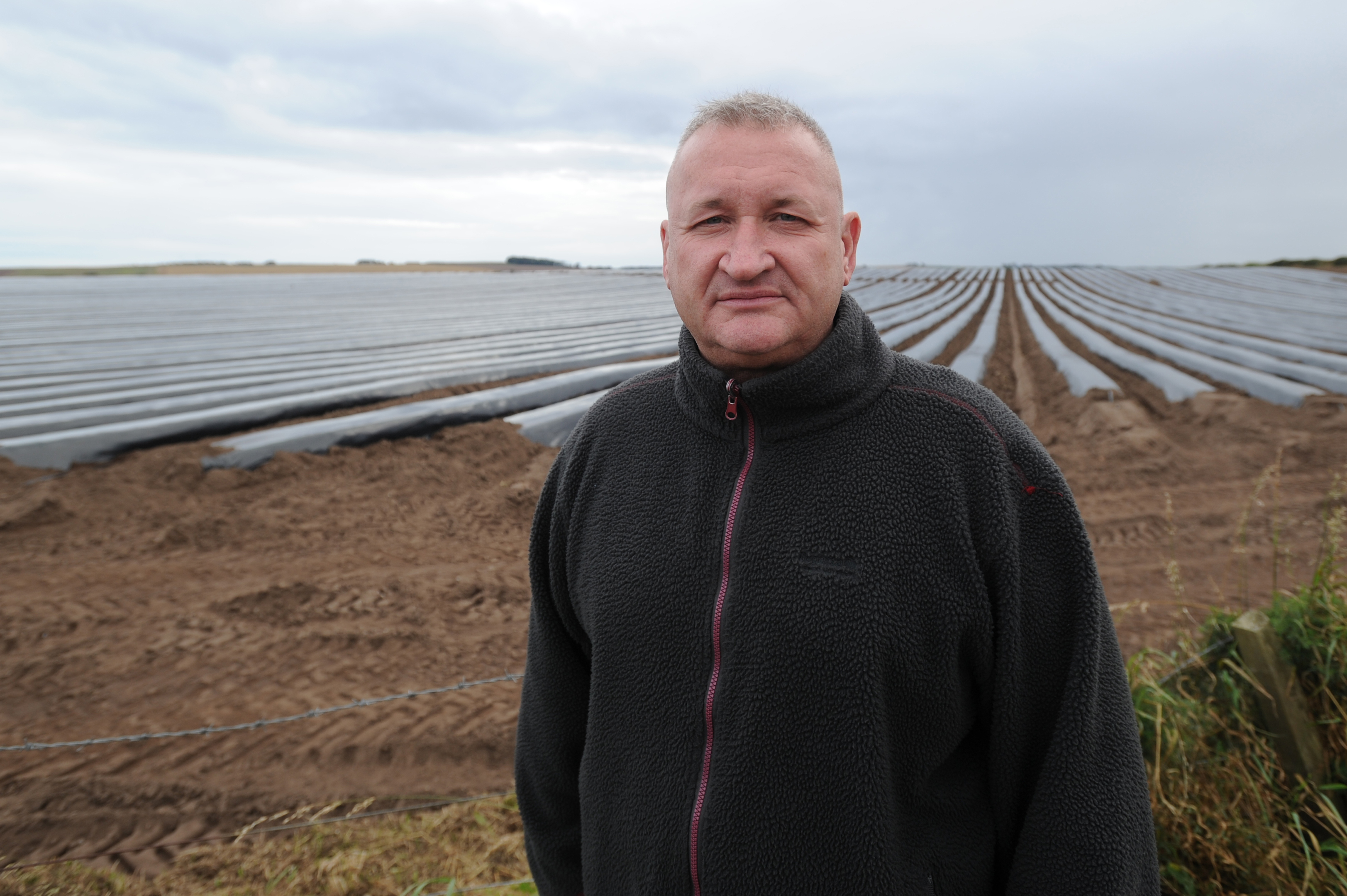 David Mackay with the field that is planned for the tunnels.