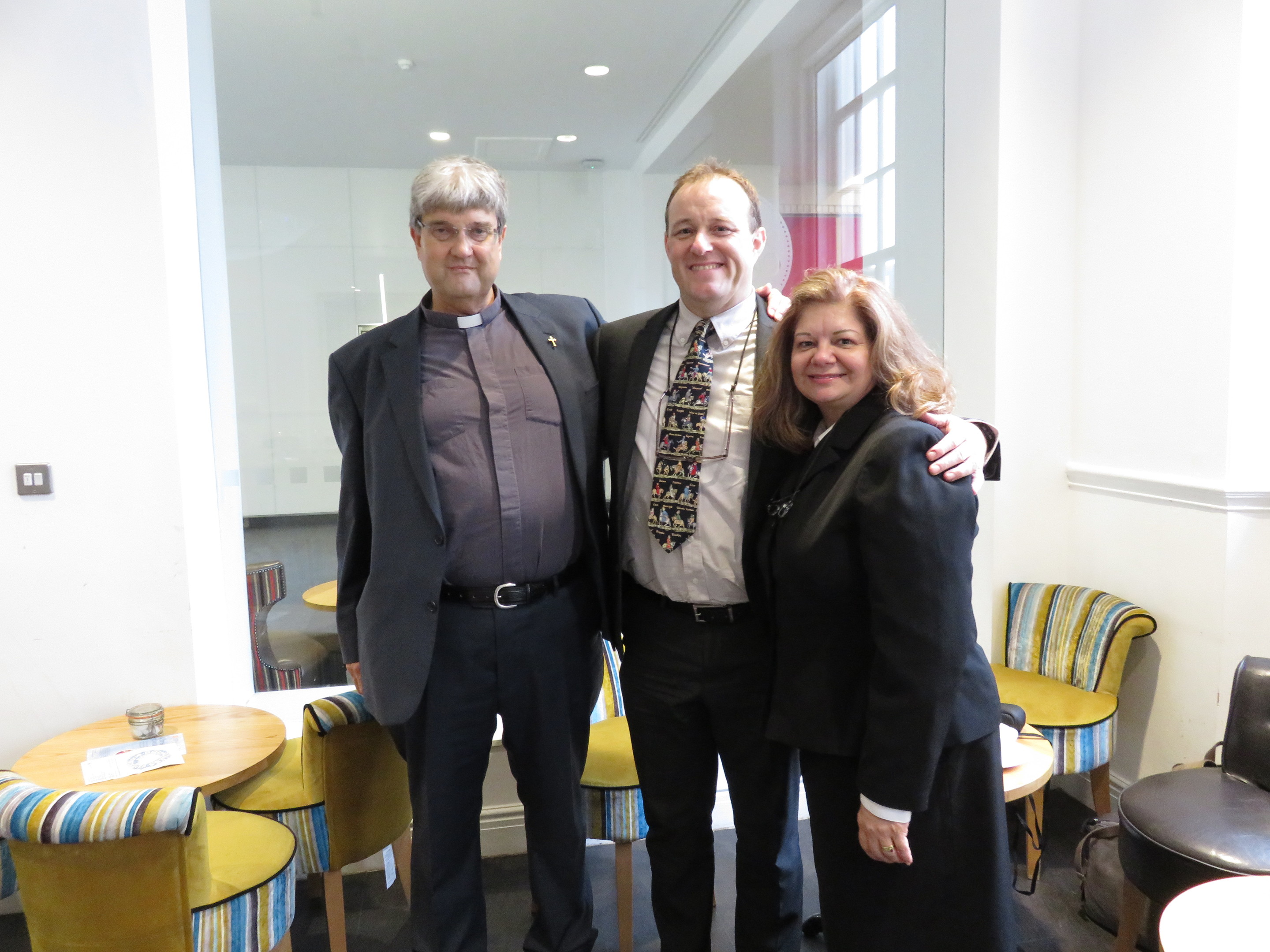 Celebrations: Karen and Bruce Officer with Reverend Roy Stagg, who married the couple