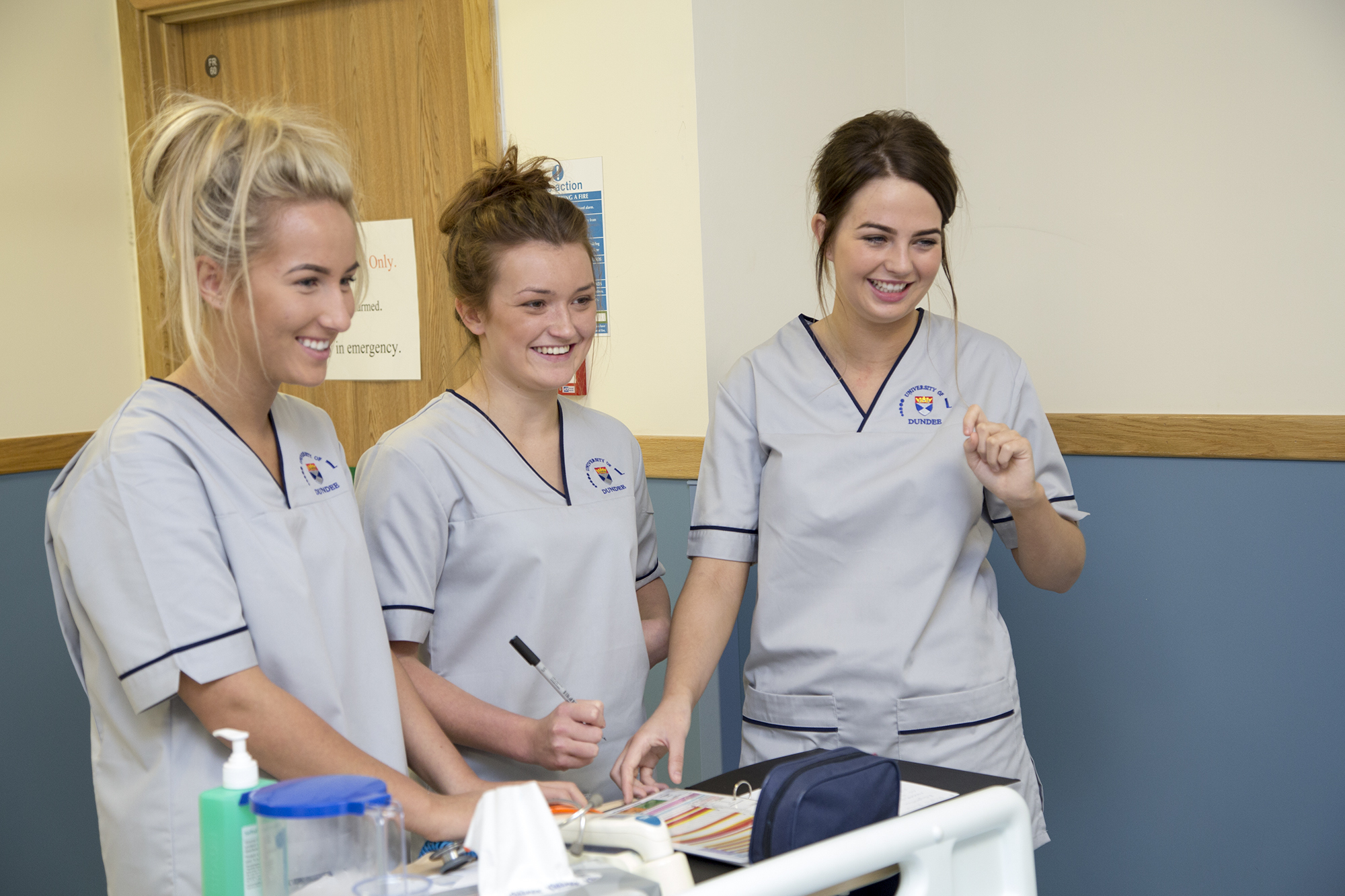 First year student nurses at work.