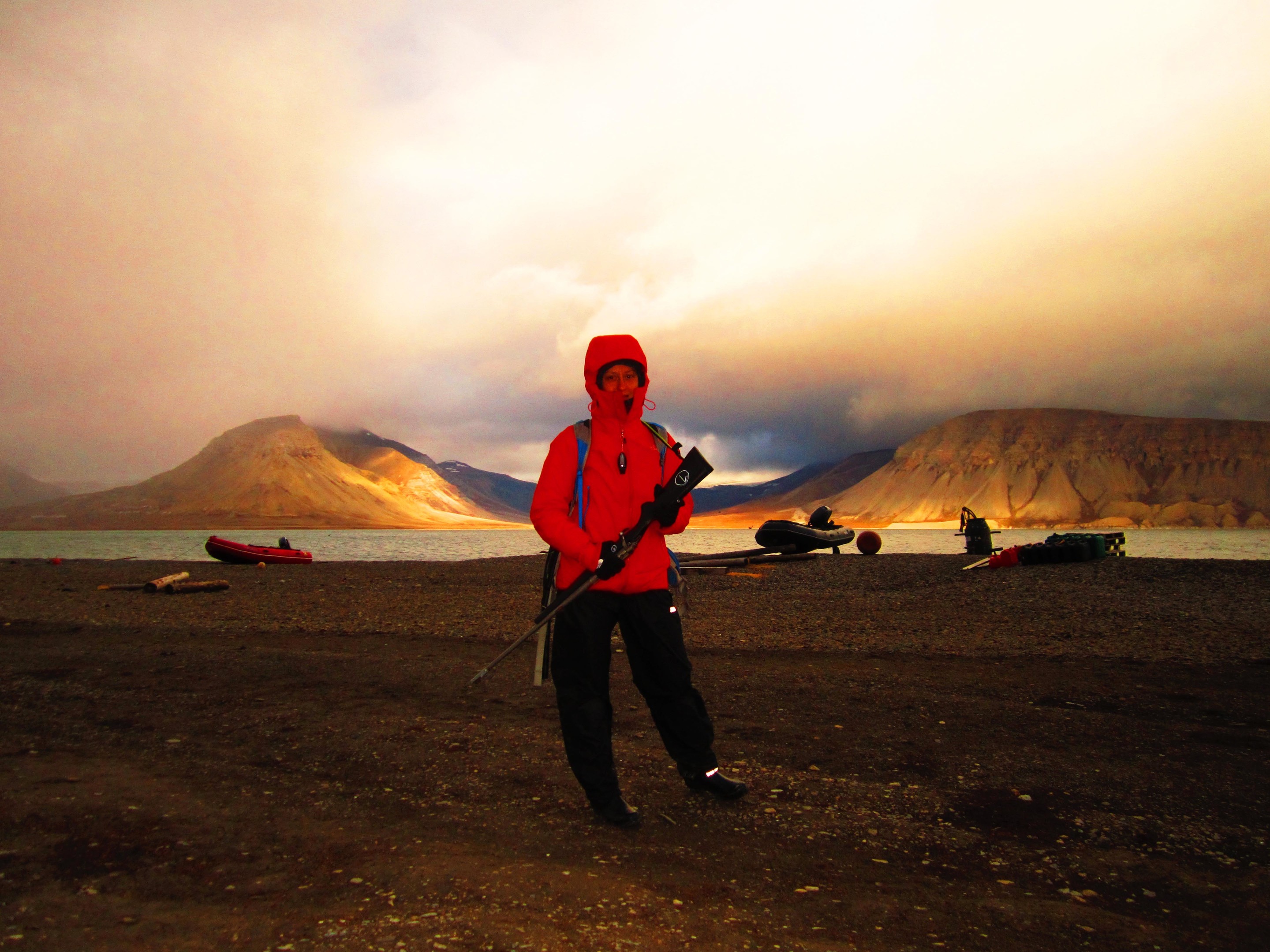 Georgia in Svalbard, armed to protect herself from polar bears