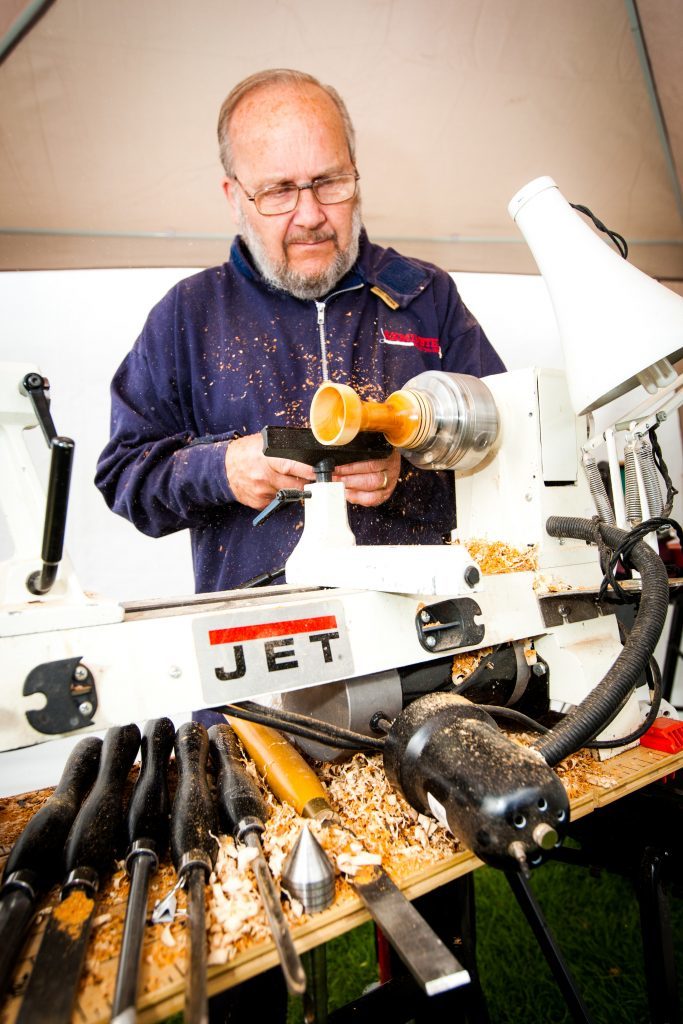 Bill Beckers, vice-chairman of Carse of Gowrie and District Men's Shed, turning wood.