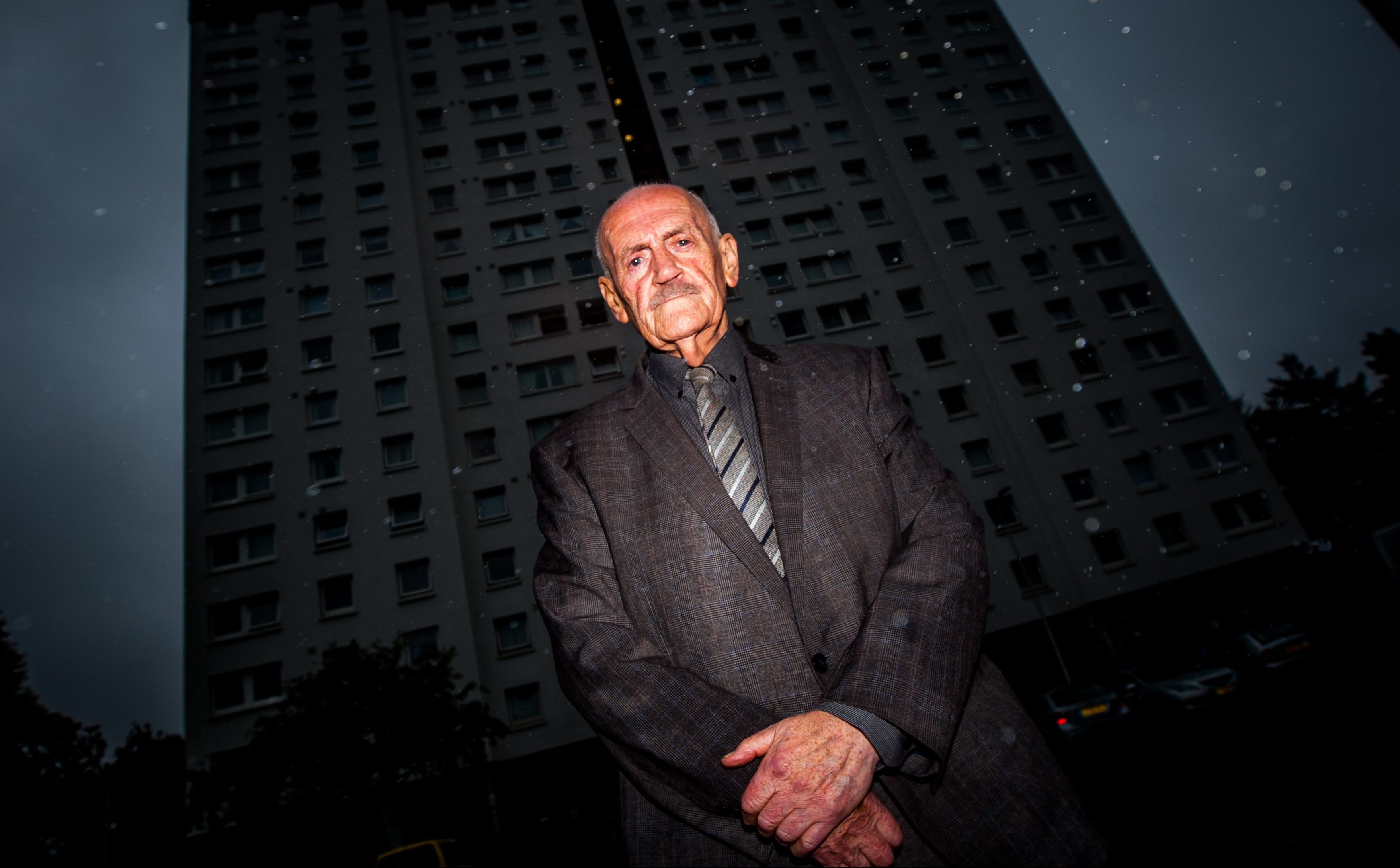 Tam Ferguson outside the Adamson Court flats.