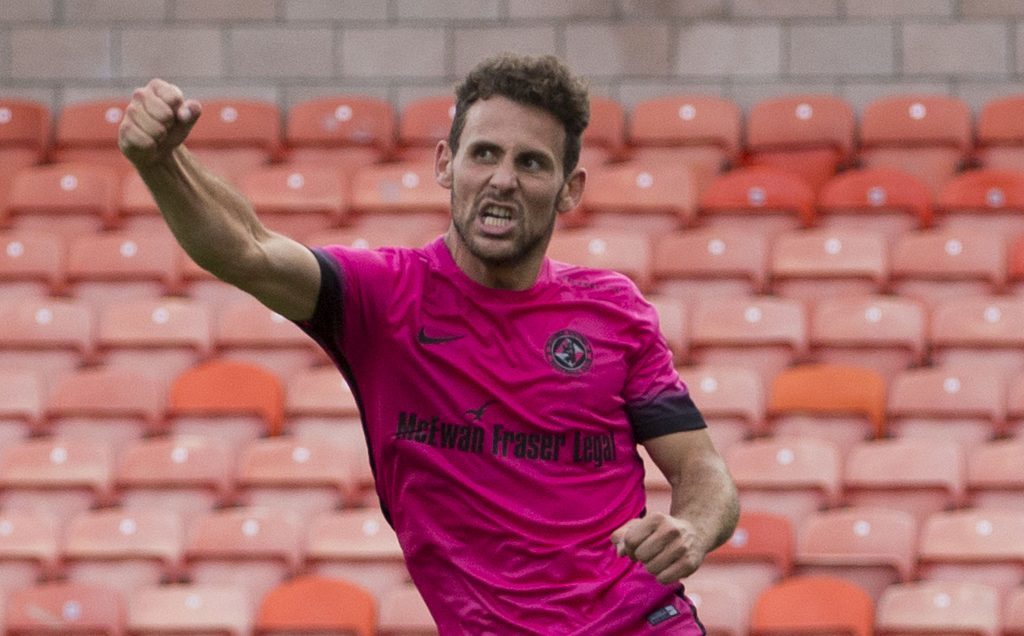 Tony Andreu celebrates his goal.