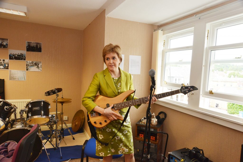 First Minister Nicola Sturgeon Signs up for the i Rights at the YMCA youth cafe in Cupar in July 2015