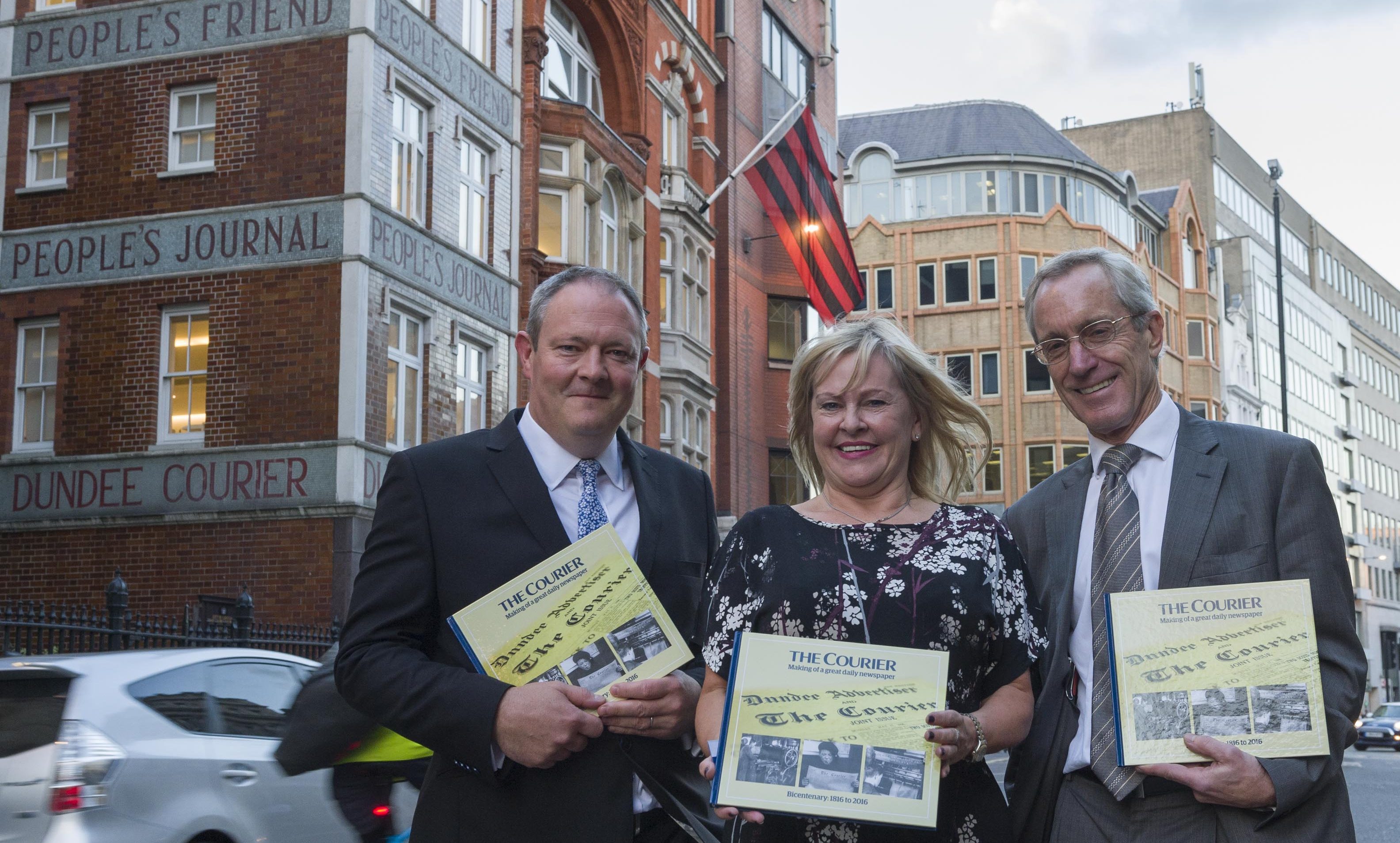 Richard Neville, Denise West, and Richard Hall outside DC Thomson's offices in Fleet Street.