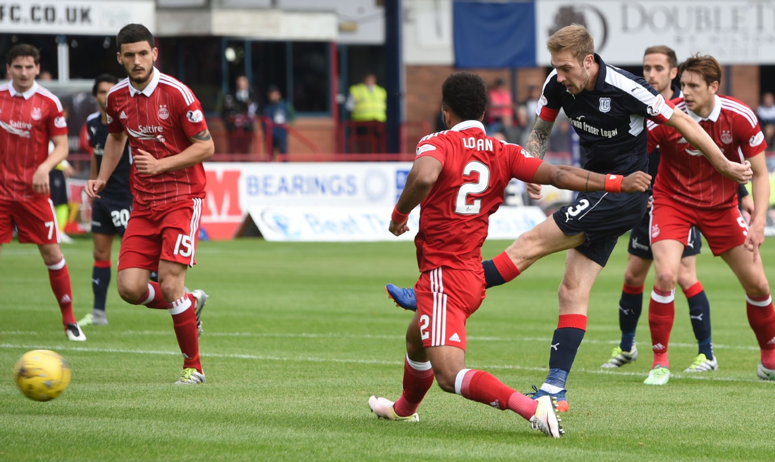 Kevin Holt opens the scoring for Dundee.