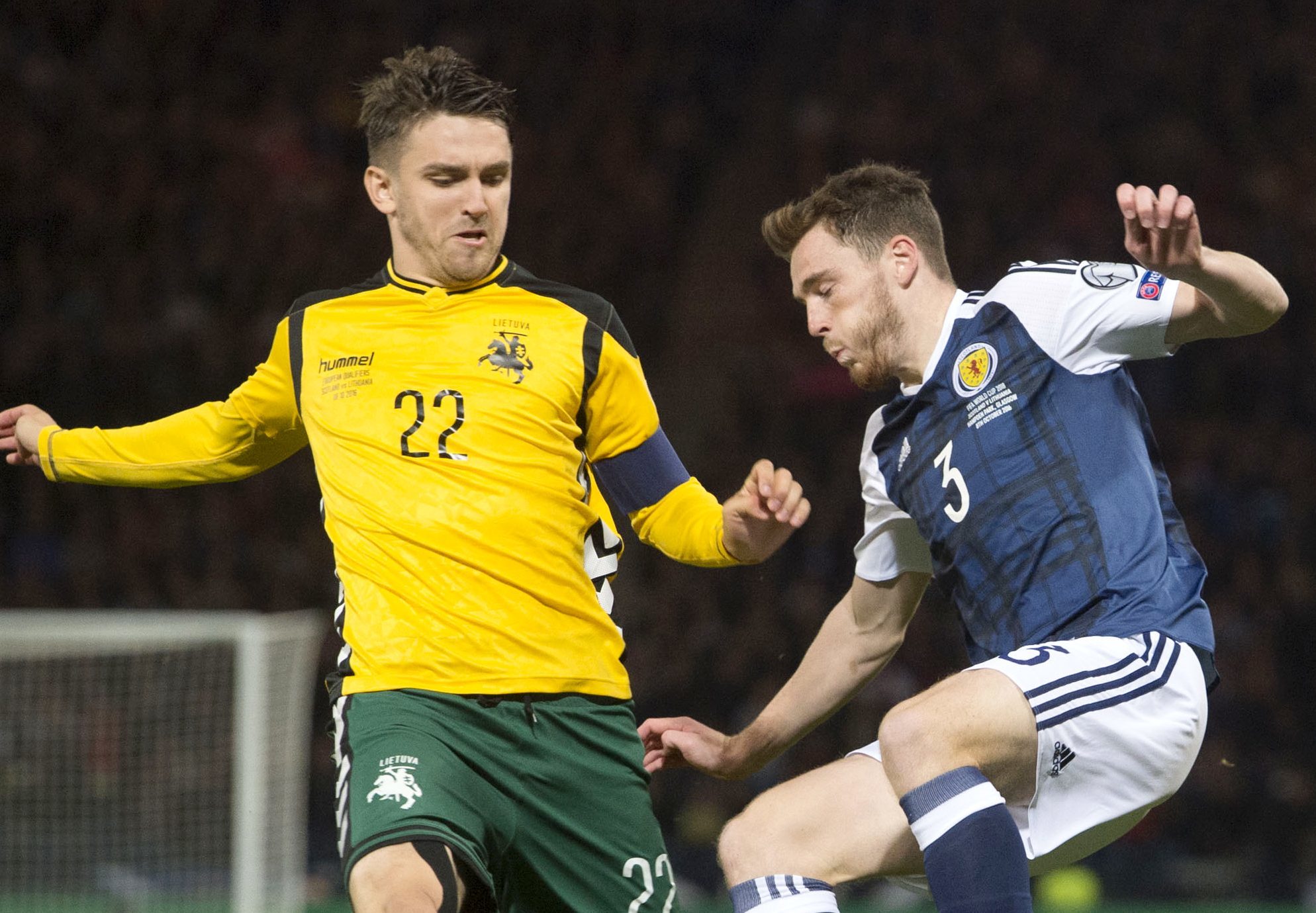 Andy Robertson competes with Lithuania's goal scorer Fiodor Cernych