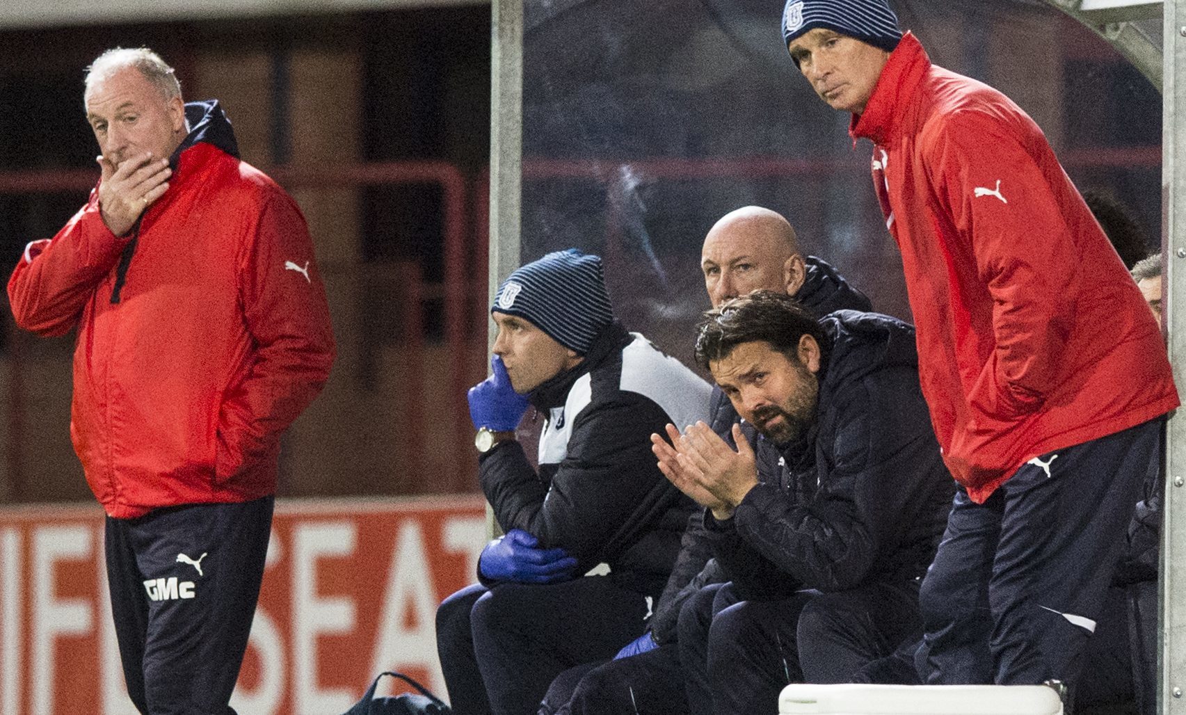 Despairing looks from the Dundee bench during the defeat to Partick Thistle.