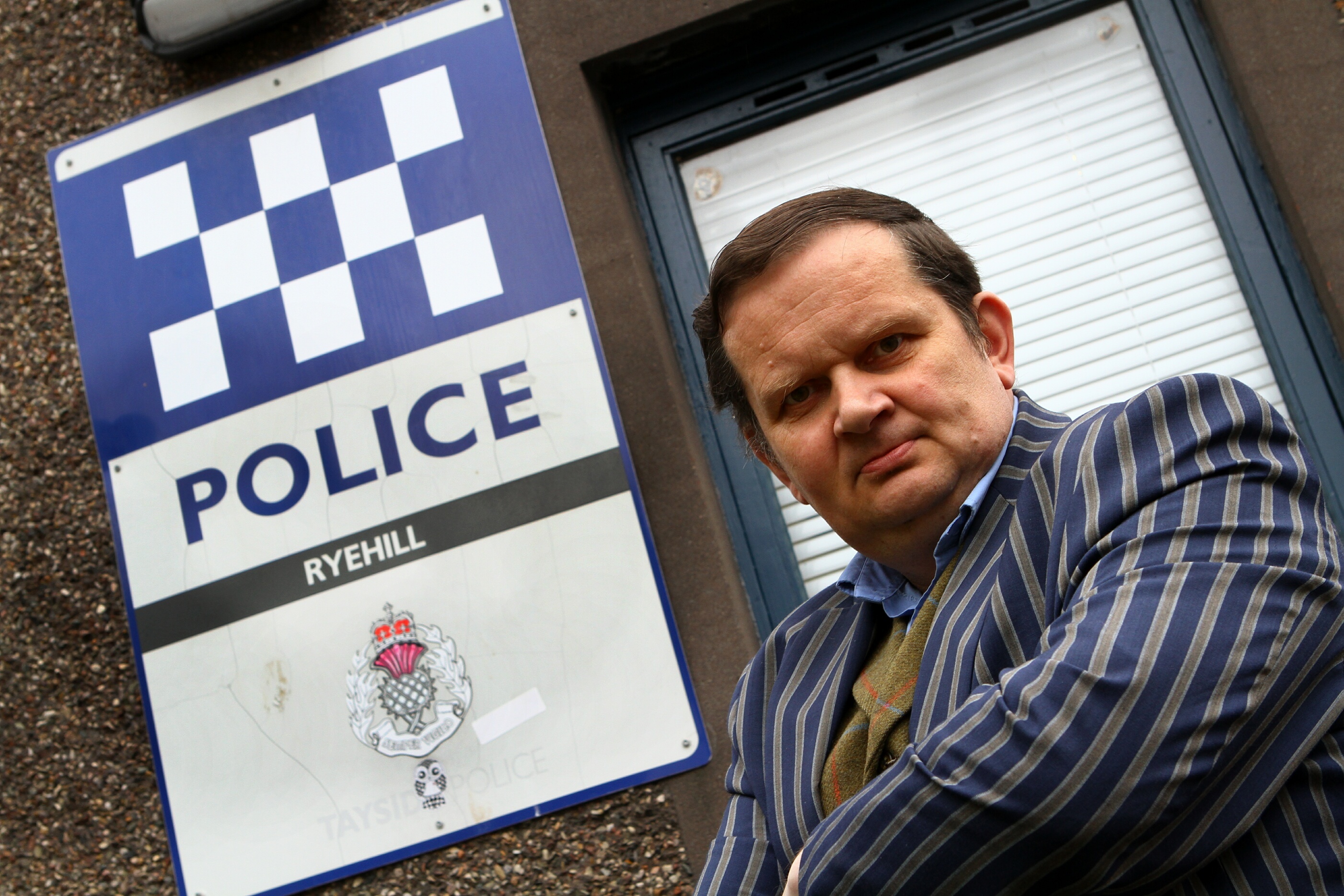 Peter Menzies, chair of the West End community council outside Ryehill police station.