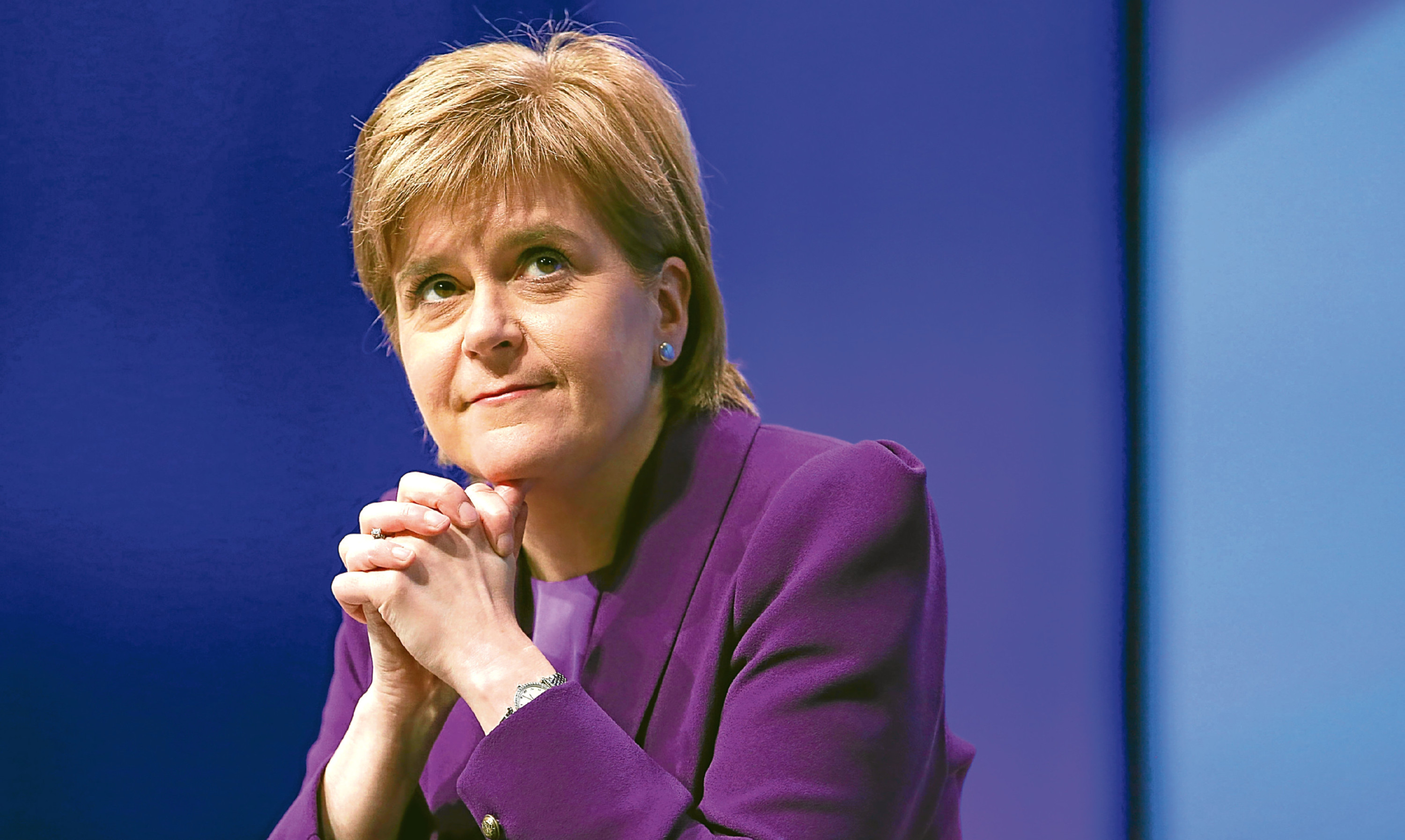 First Minister Nicola Sturgeon should "start holding UK Government to account".