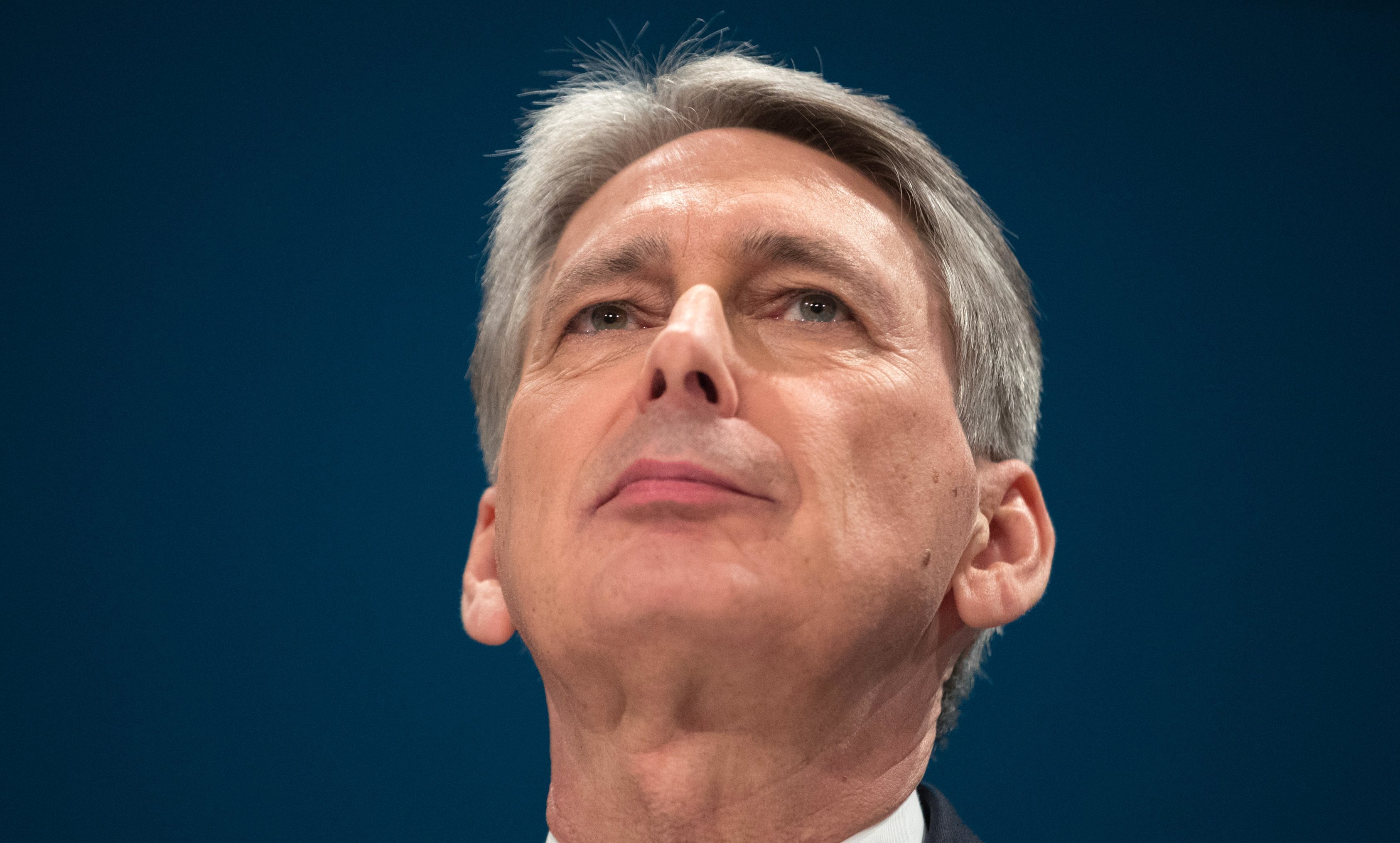 Philip Hammond delivers a speech on the economy during the second day of the Conservative Party Conference in Birmingham.