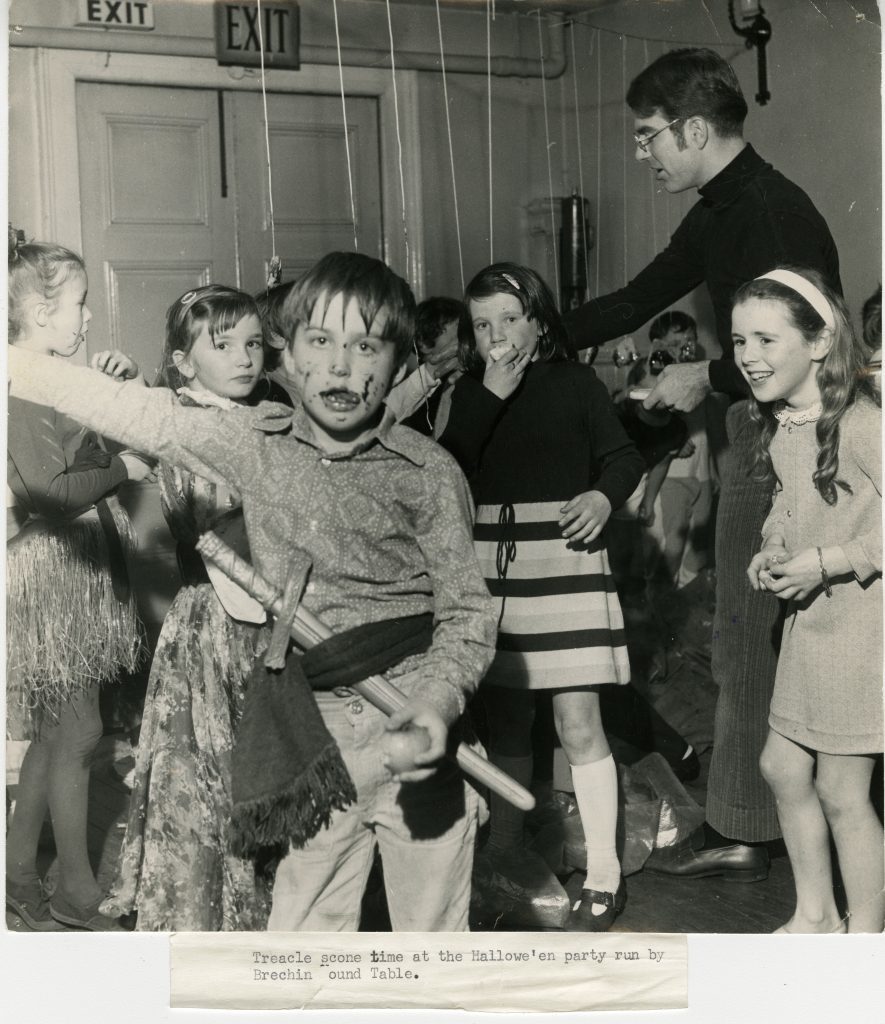 Treacle Scone time at the Halloween party run by Brechin Round Table on November 4, 1973.