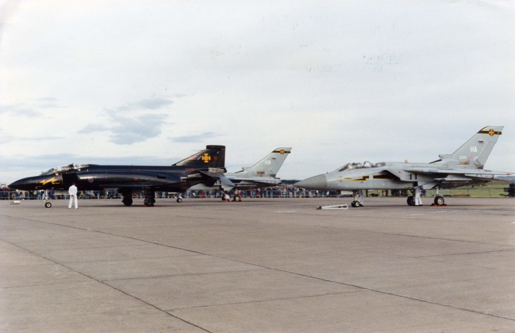 Pictured after its final flight is the "Black Mike" phantom, and two of its successors, F3 Tornados at the RAF Leuchars Air Show.  22 September 1990.