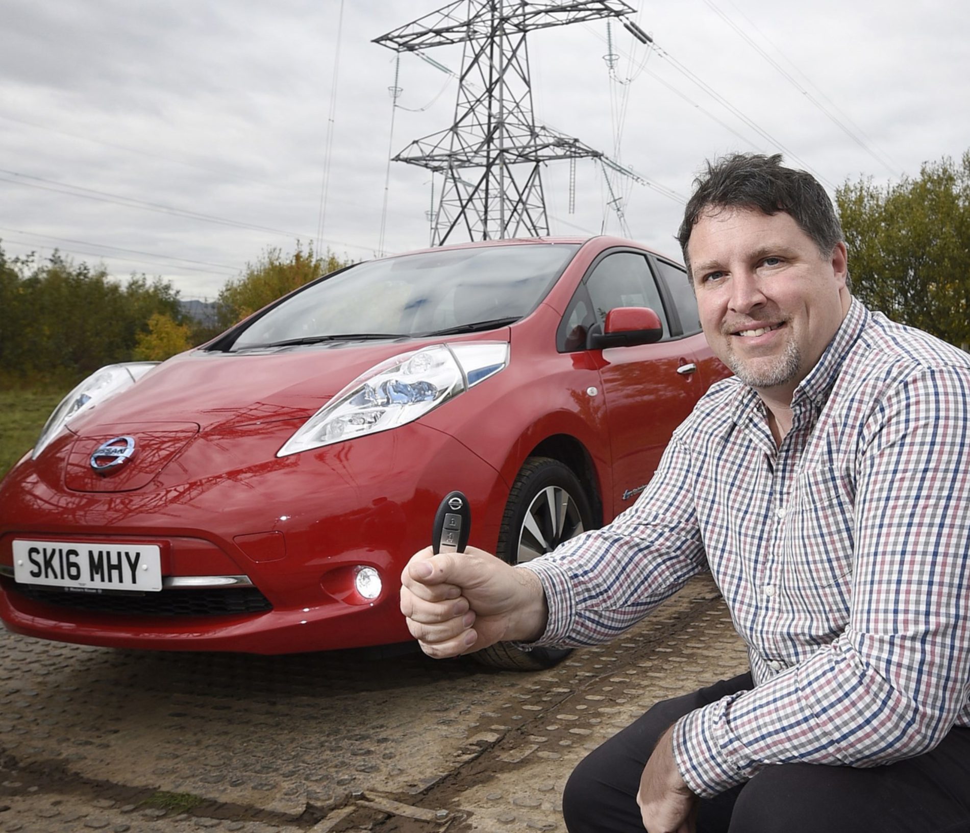 Neil Swanson of Rosyth with electric car.