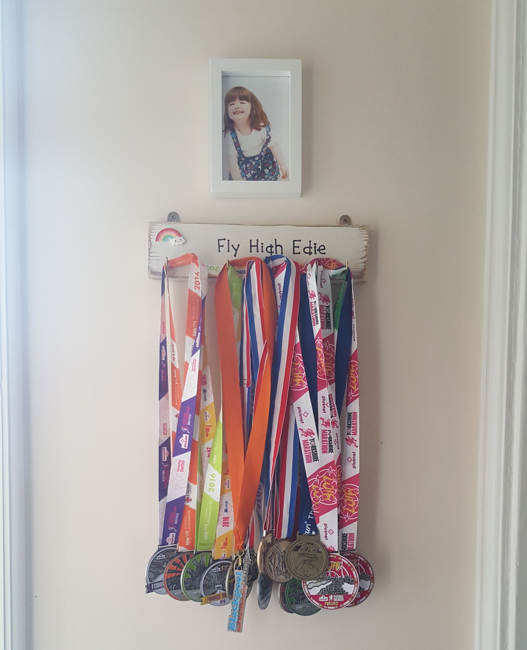 Tom and Cheryl's impressive clutch of medals dedicated to Edie