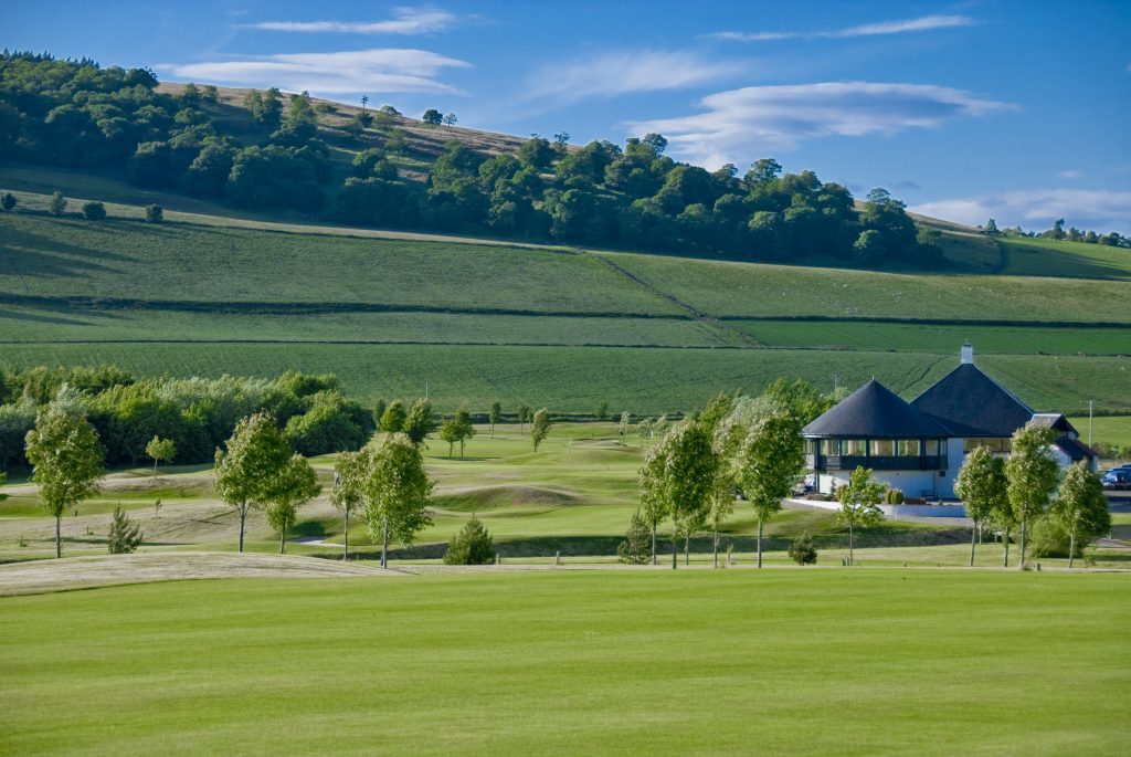 Glenisla golf clubhouse sitting in rolling farmland near Alyth on a summer day