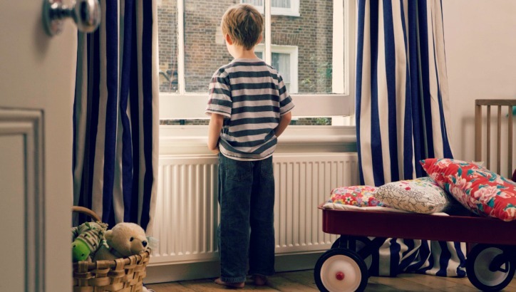 Stock image of a child home alone