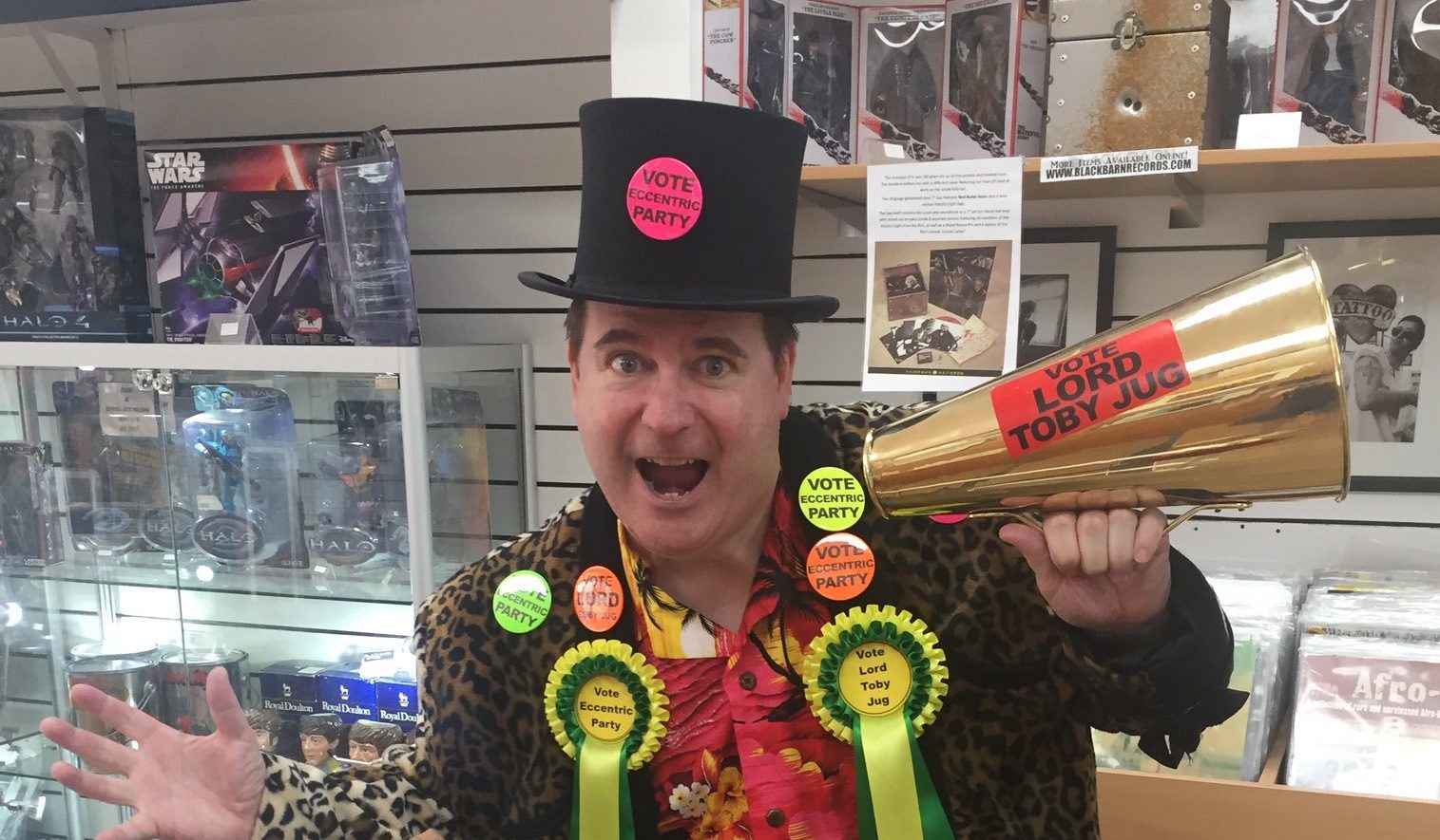 Lord Toby Jug of the Eccentric Party of Great Britain posing at Euromillions winner Adrian Bayford's shop