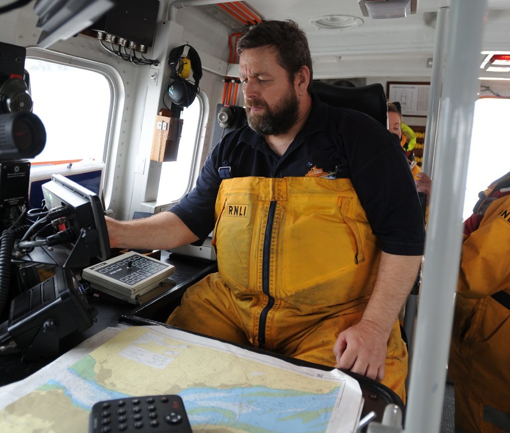 Mechanic Scott Huggins inside the lifeboat.