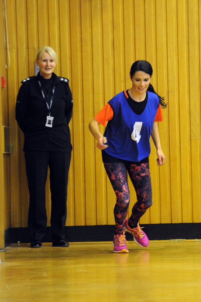 Inspector Irene Coyle watches Gayle in action.