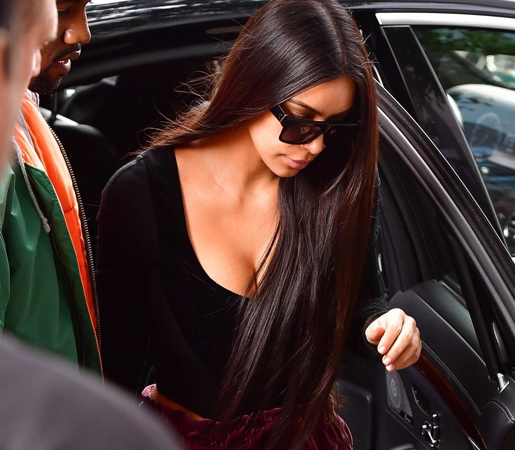 Kanye West and Kim Kardashian arrive to their Manhattan apartment after Kim was robbed in her Paris, France hotel room on October 3.