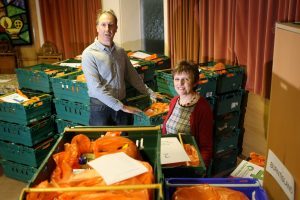 Councillor Judy Hamilton and Ian Campbell, chairman of Kirkcaldy foodbank, preparing deliveries for service users.