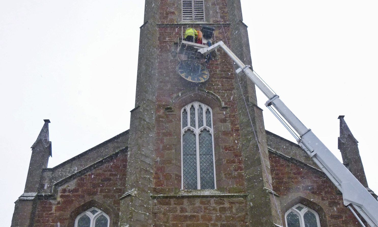 The clock undergoing maintenance.