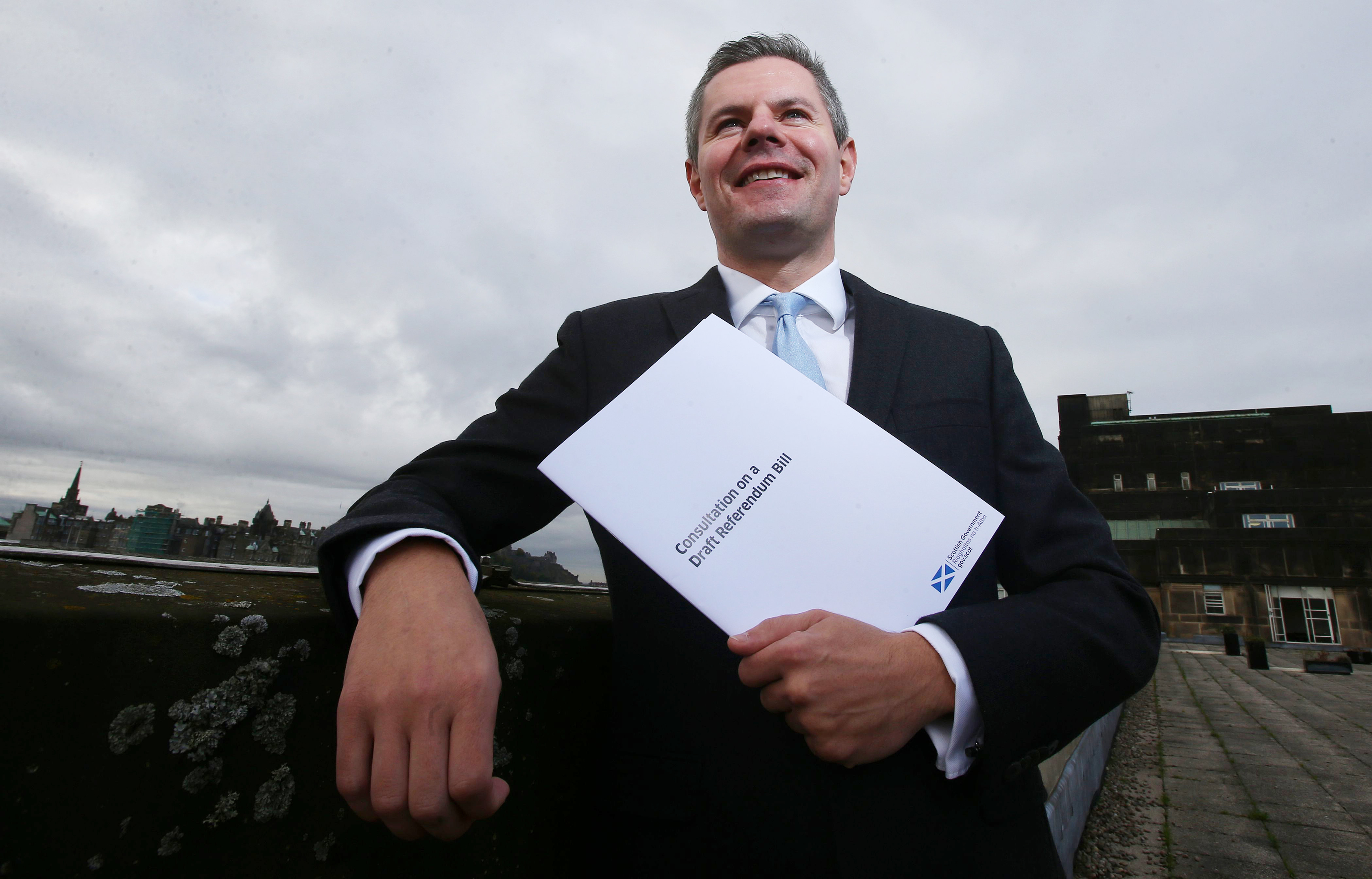 Constitution Minister Derek Mackay holds a copy of the Draft Referendum Bill.