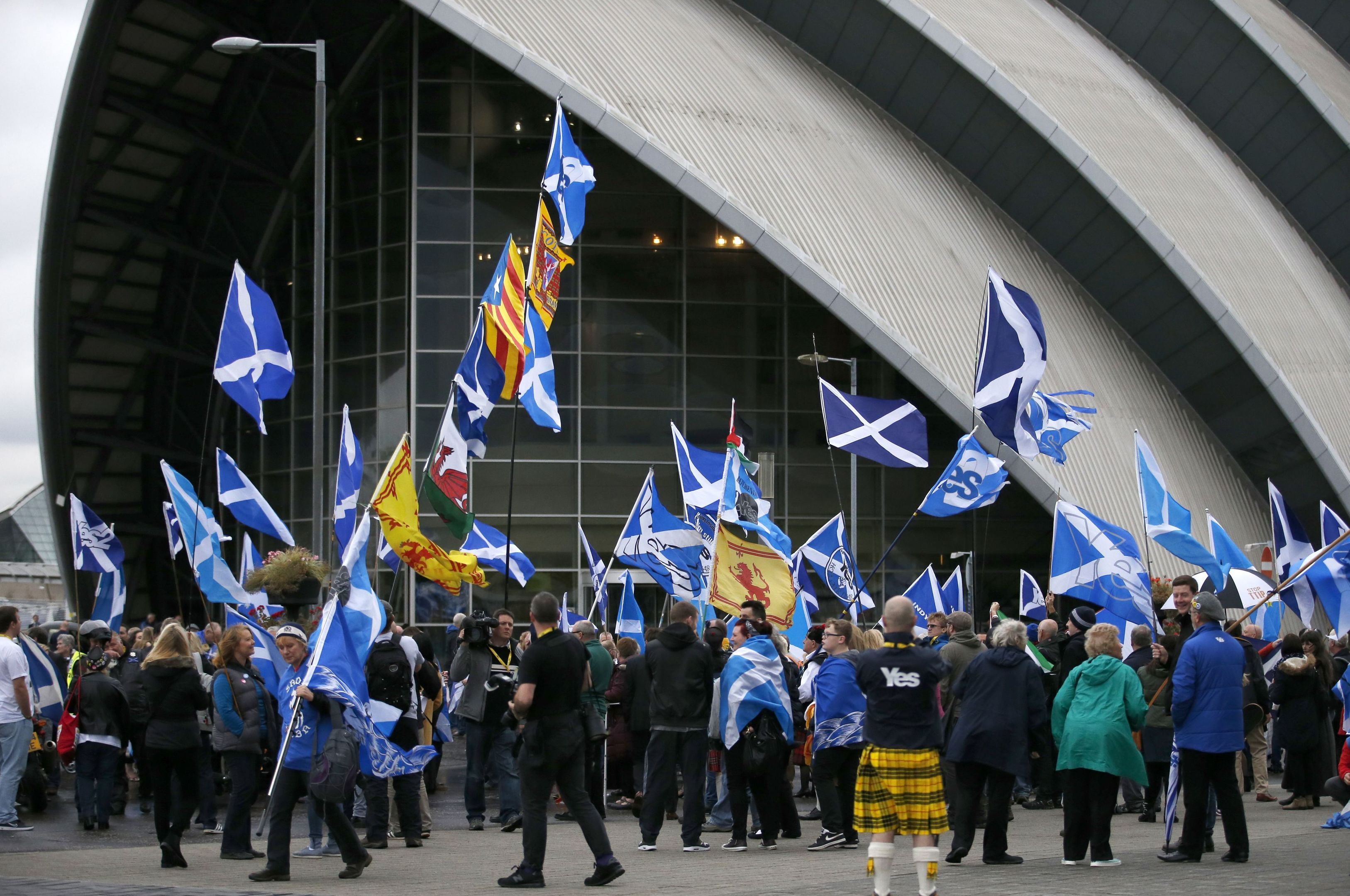 Scottish Independence activists take part in an Independence 2 rally, outside  the SNP conference in Glasgow.