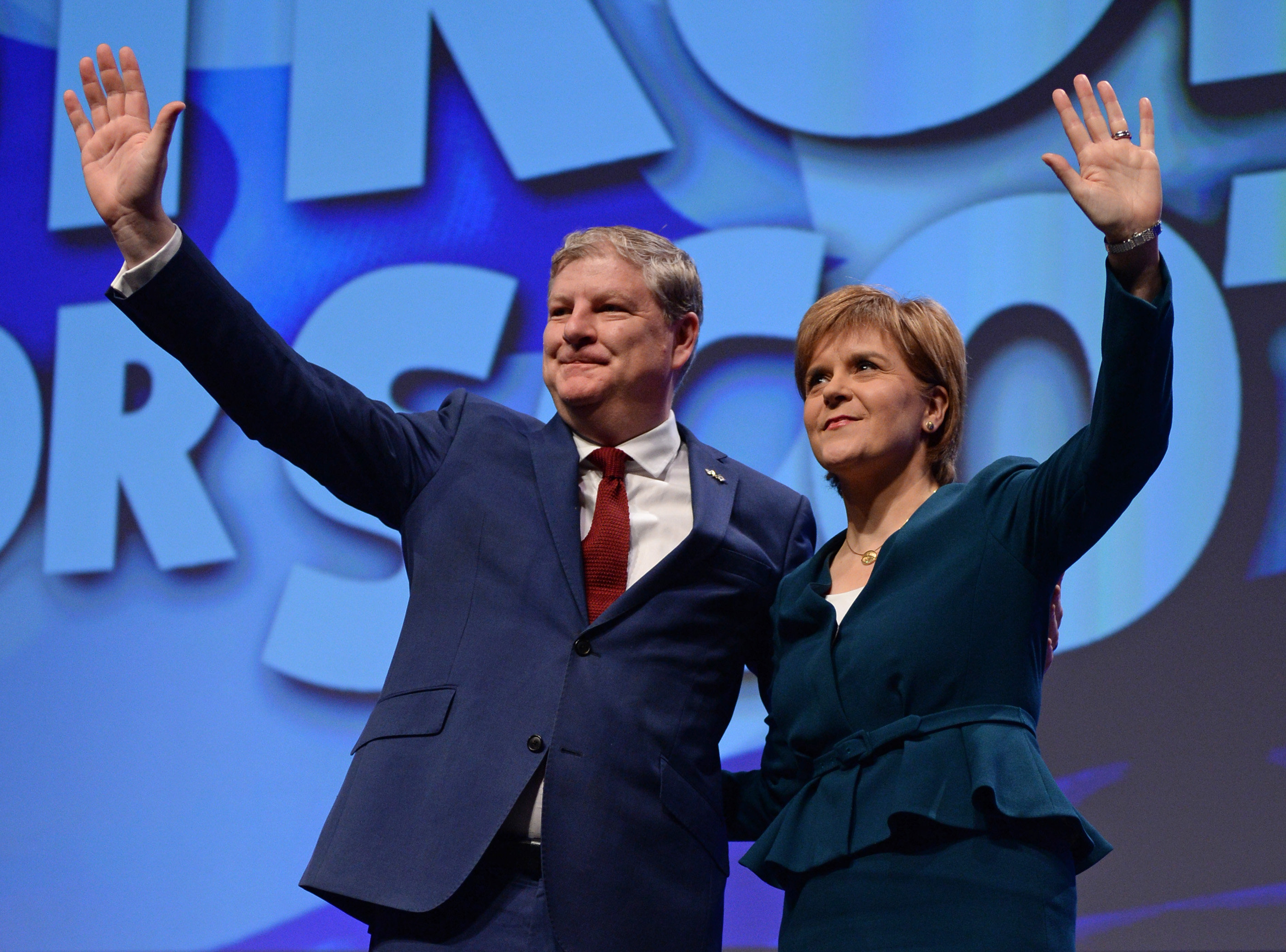 Scottish First Minister Nicola Sturgeon and new SNP deputy leader Angus Roberston, addressing the SNP Autumn Conference in Glasgow SECC, where she warned against the dangers of hard Brexit.