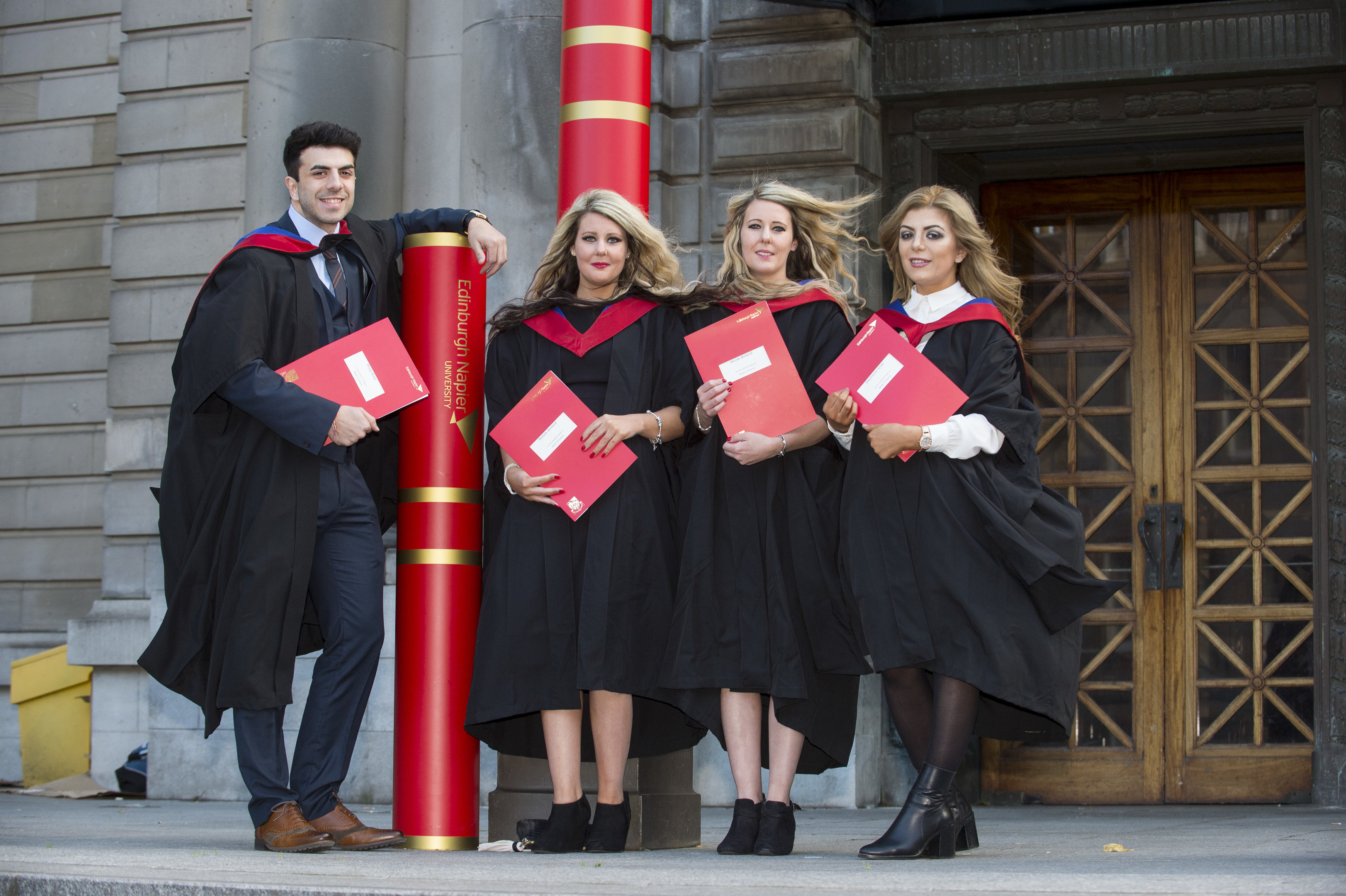 Twins and siblings graduating from the Human resources Management Masters programme.  Brother and sister Phillip and Stephanie Amar and identical twins Natalie and Nicole Bolland.  L-R Philip, Natalie, Nicole and Stephanie.