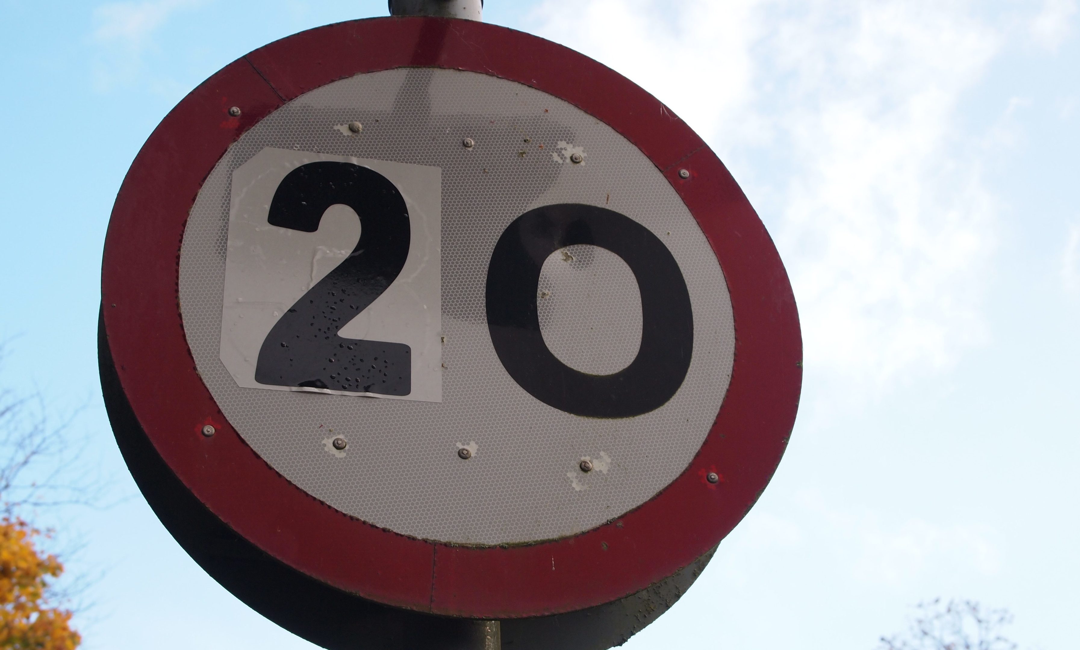 Police Scotland had to become involved after a 20mph protest at Coupar Angus saw signs changed by campaigners.