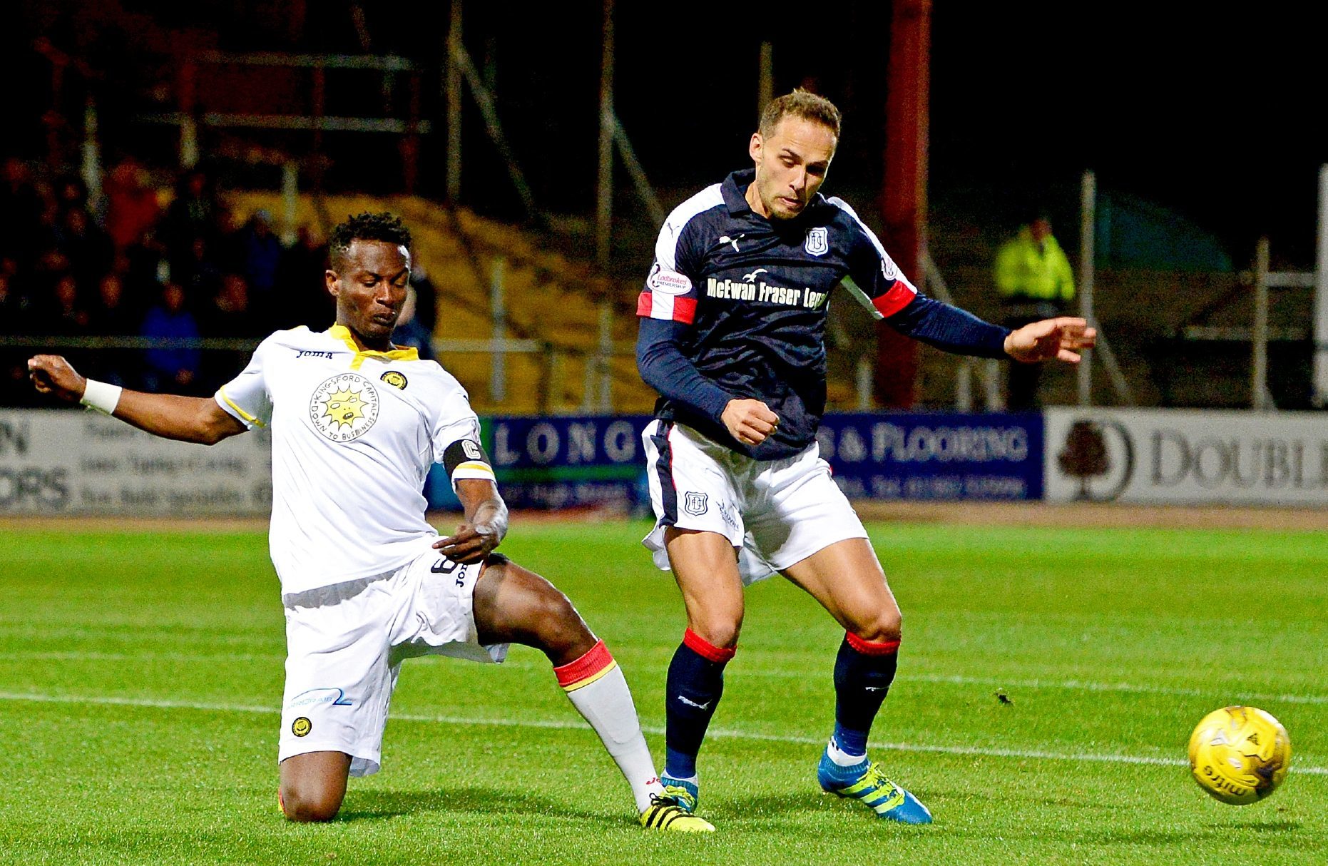 Tom Hateley is challenged by Partick player Abdul Osman.