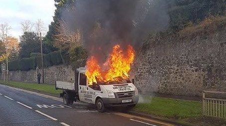 The van was engulfed in flames.