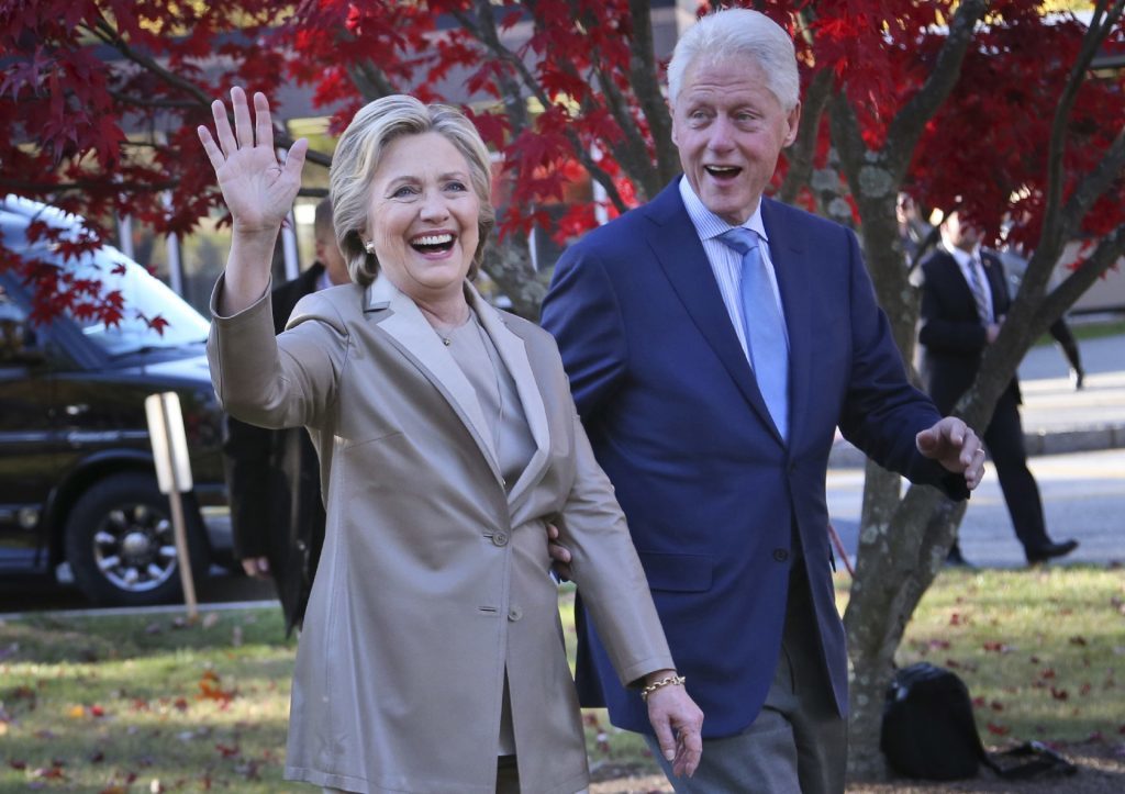 Democratic presidential candidate Hillary Clinton, and her husband former President Bill Clinton, greet supporters after voting in Chappaqua, N.Y.