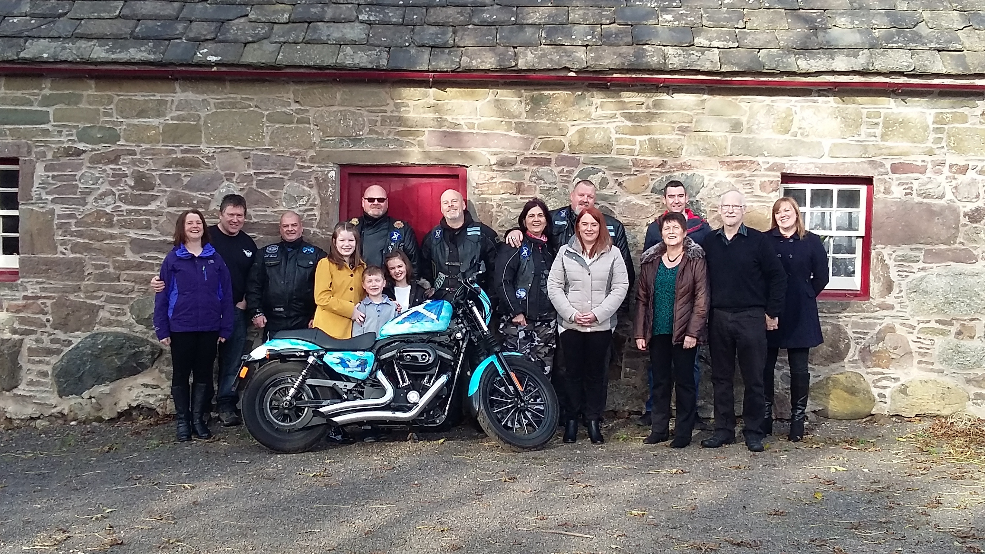 The memorial gathering at Davidson Cottage with the special bike