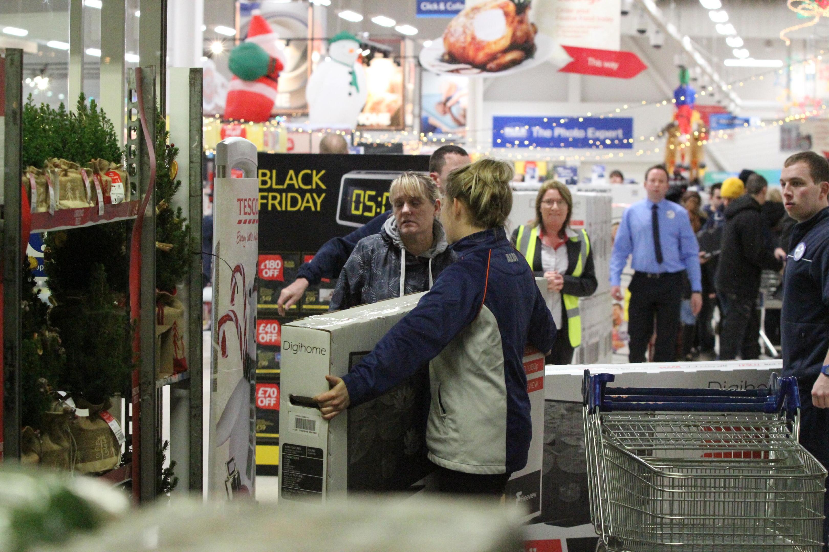 Shoppers hunt for bargains on Black Friday last year.