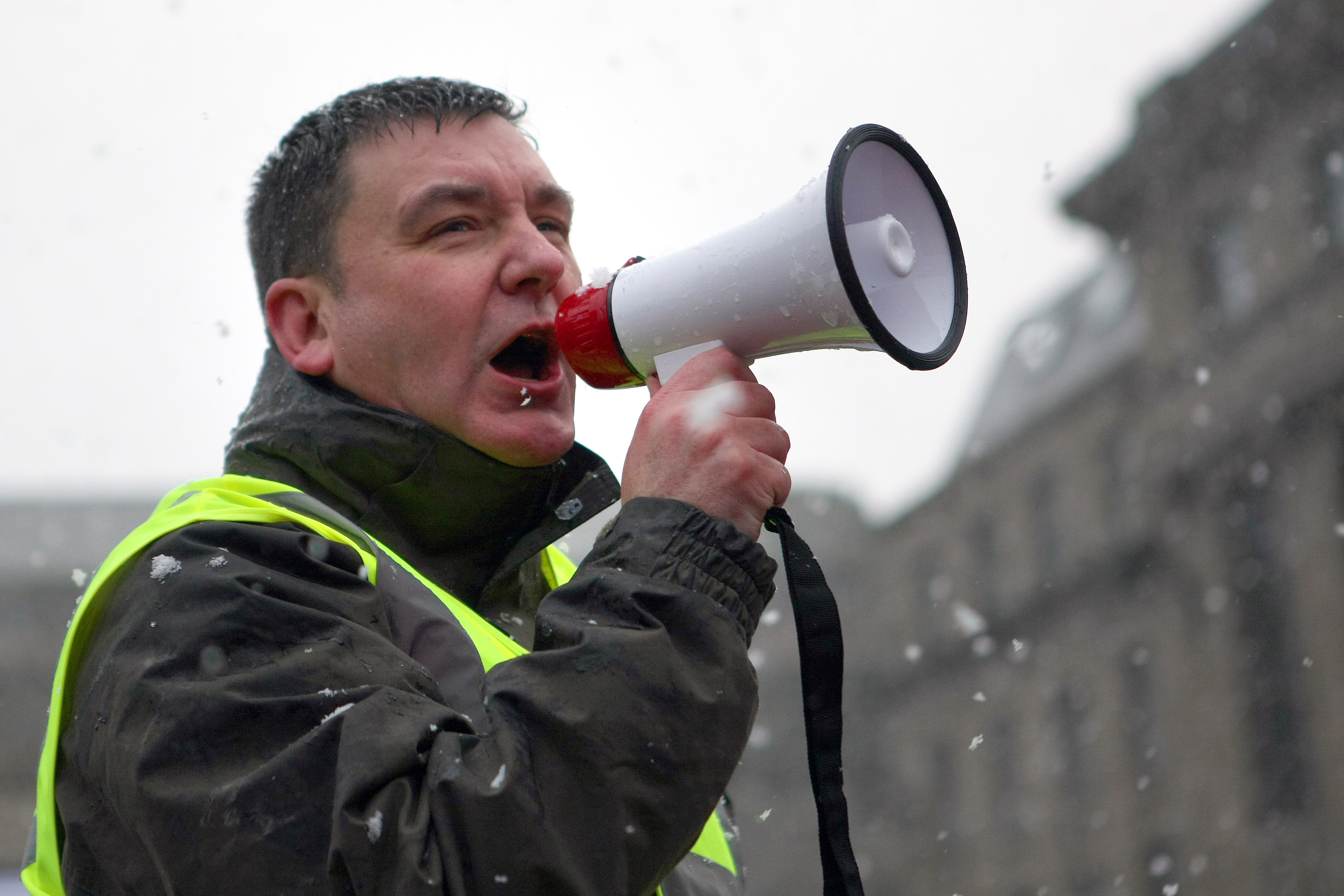 Jim McFarlane protesting against council cuts.