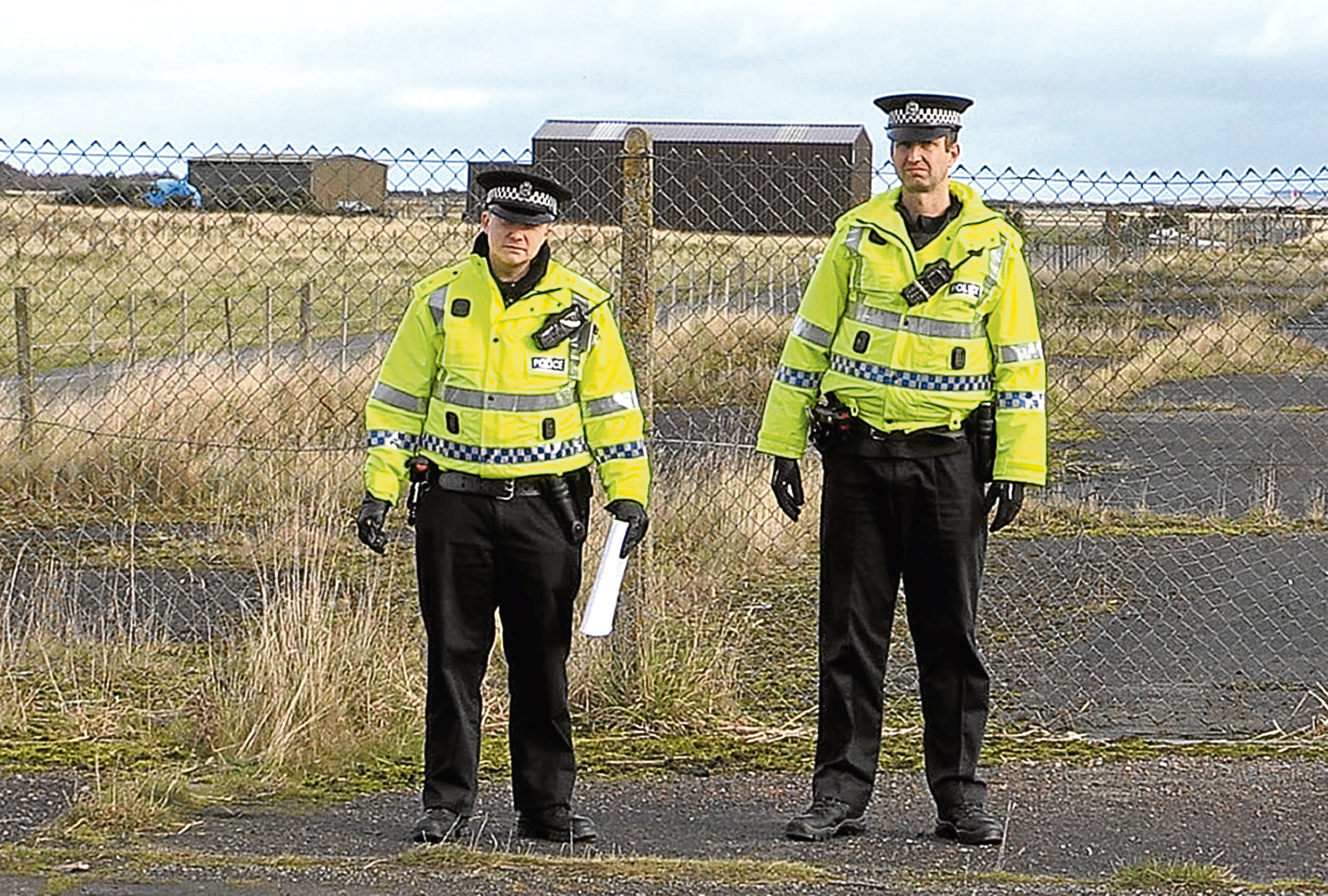 Police outside RAF Tain.