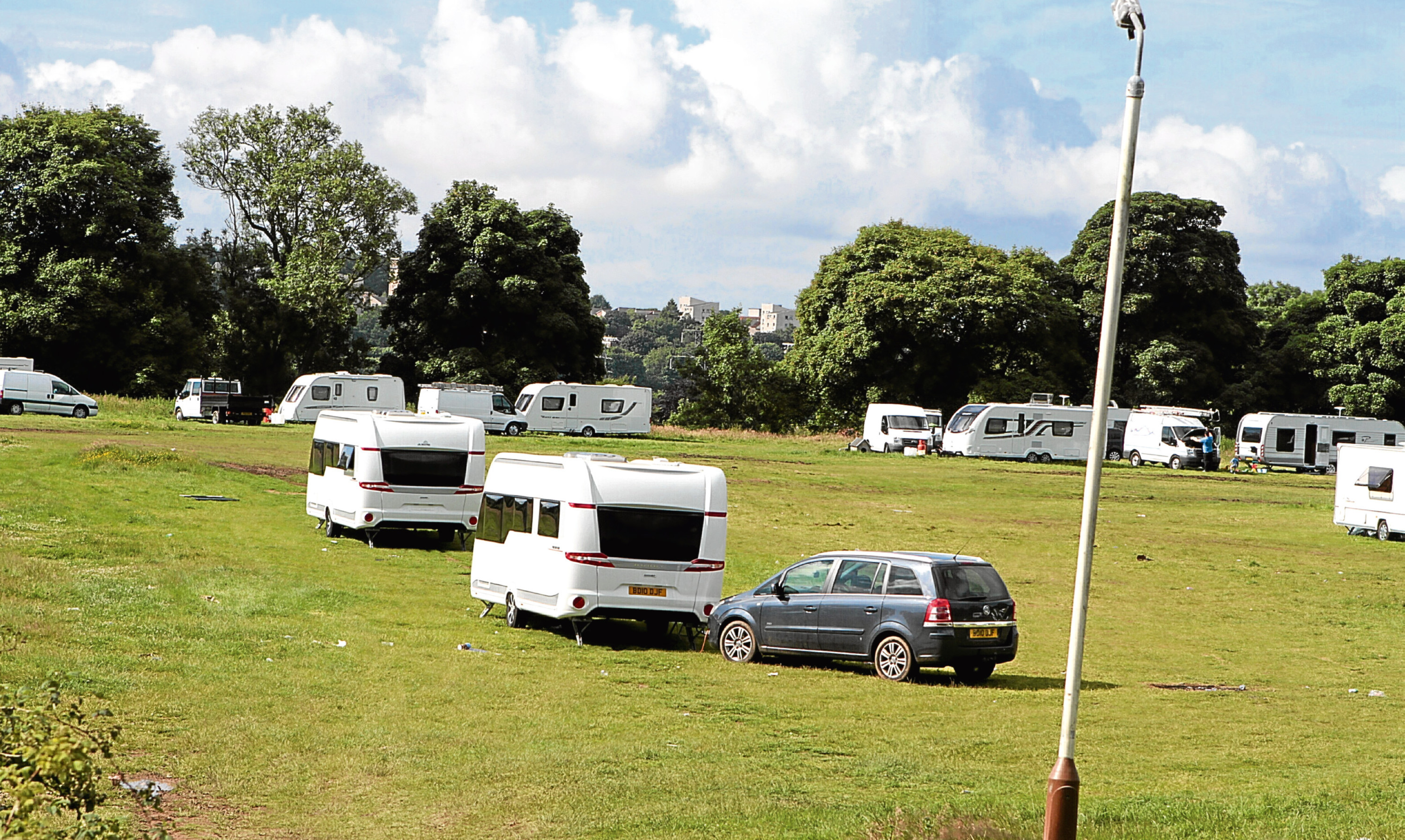 Travellers' vehicles during a stop near Camperdown Park, Dundee.