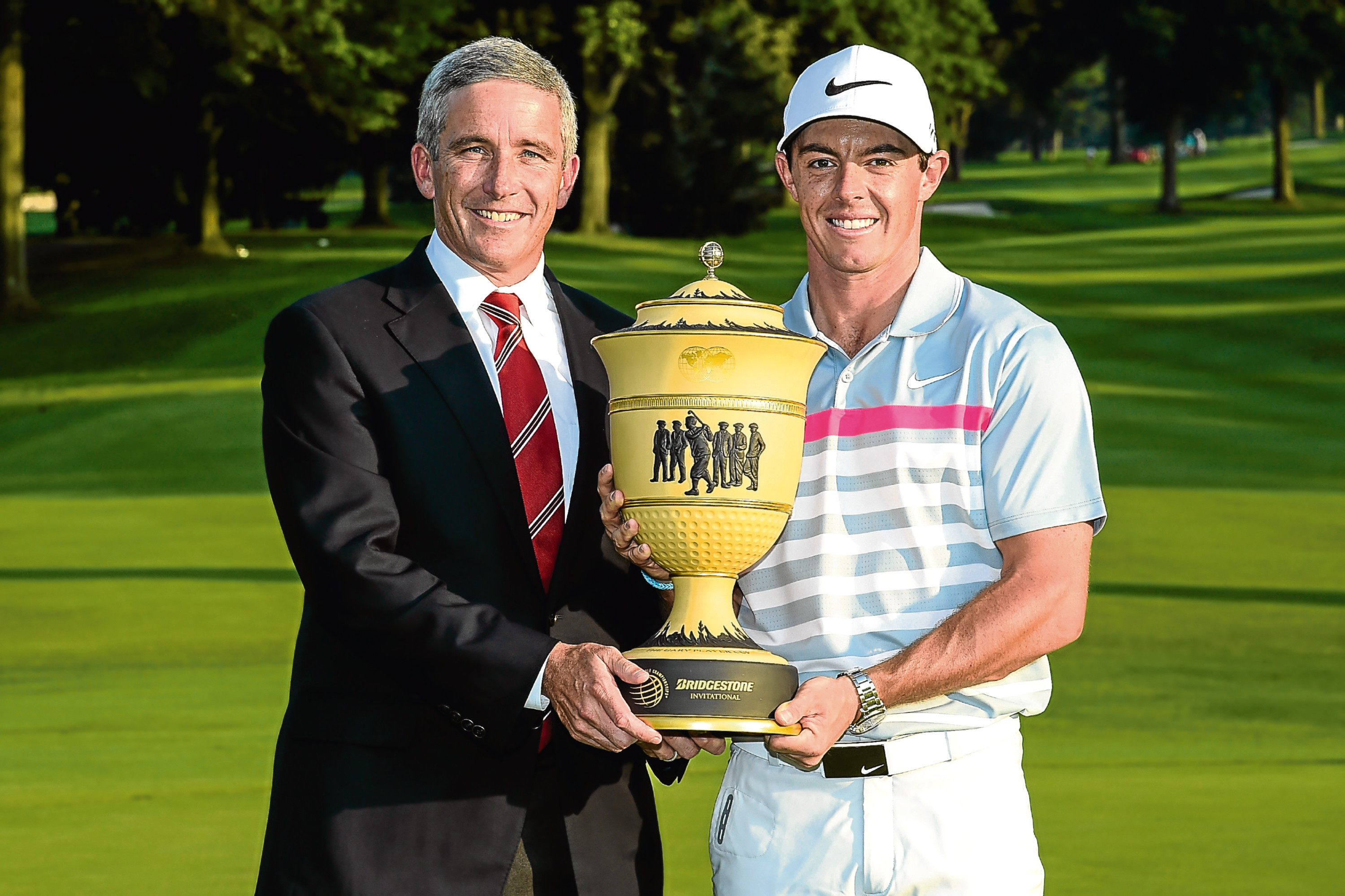 Jay Monahan and Rory McIlroy.