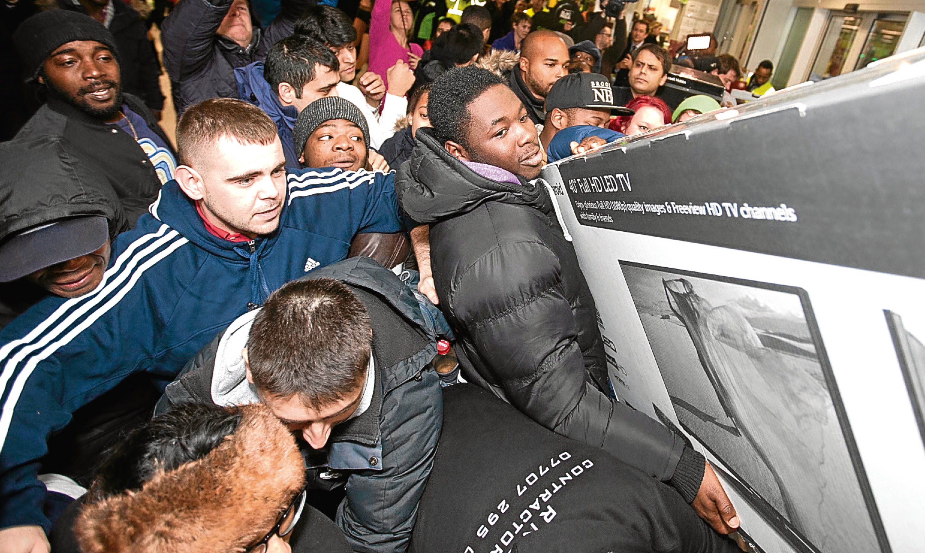 Scuffles broke out in UK stores as customers fought for Black Friday bargains in 2014