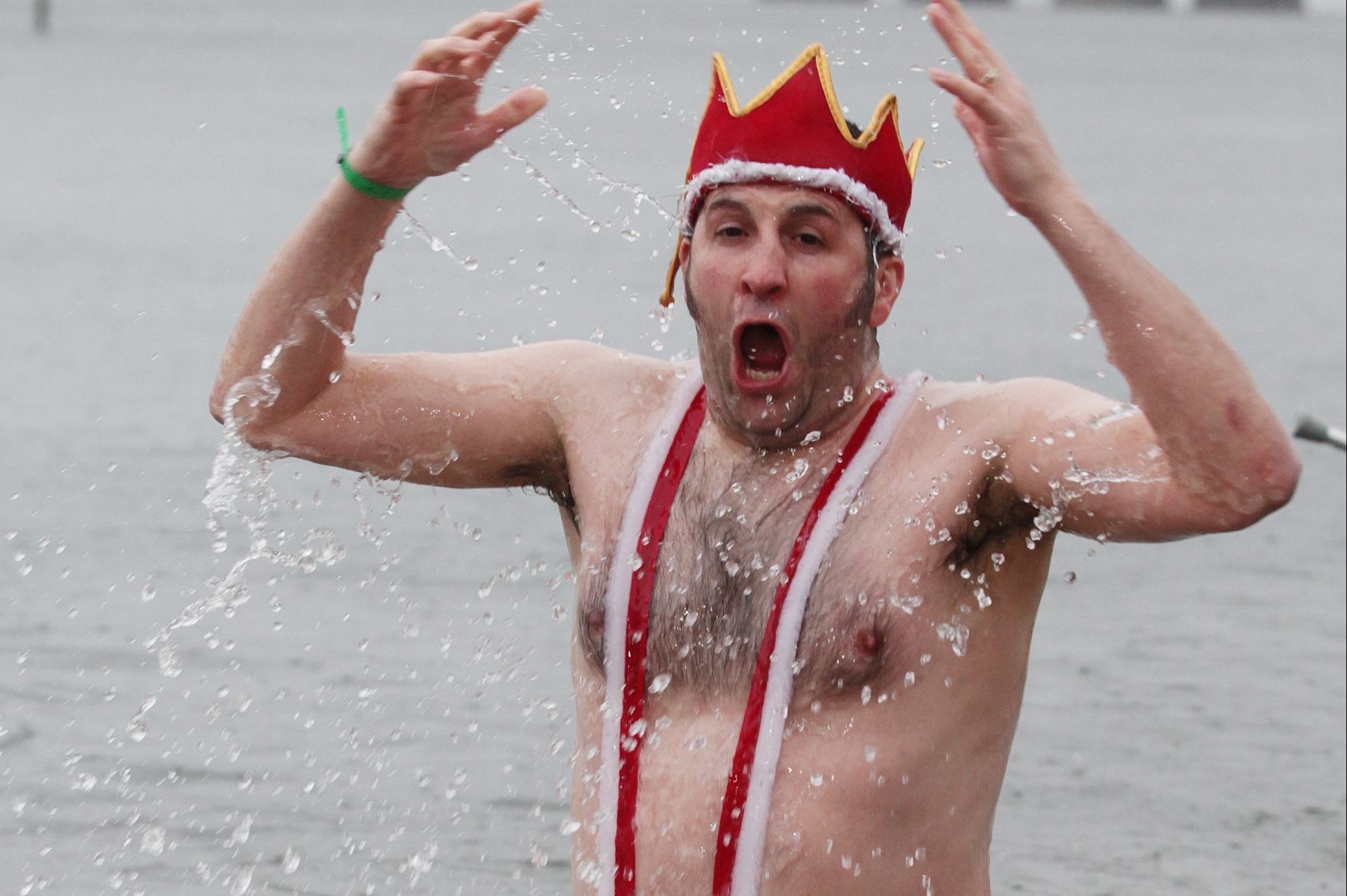 A man wears a Mankini during a festive dook.