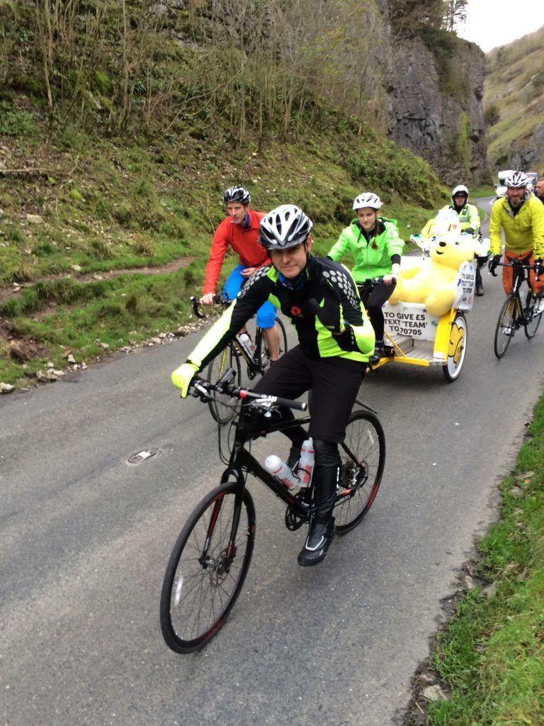 Amira rides the rickshaw in 2015 through Cheddar Gorge.