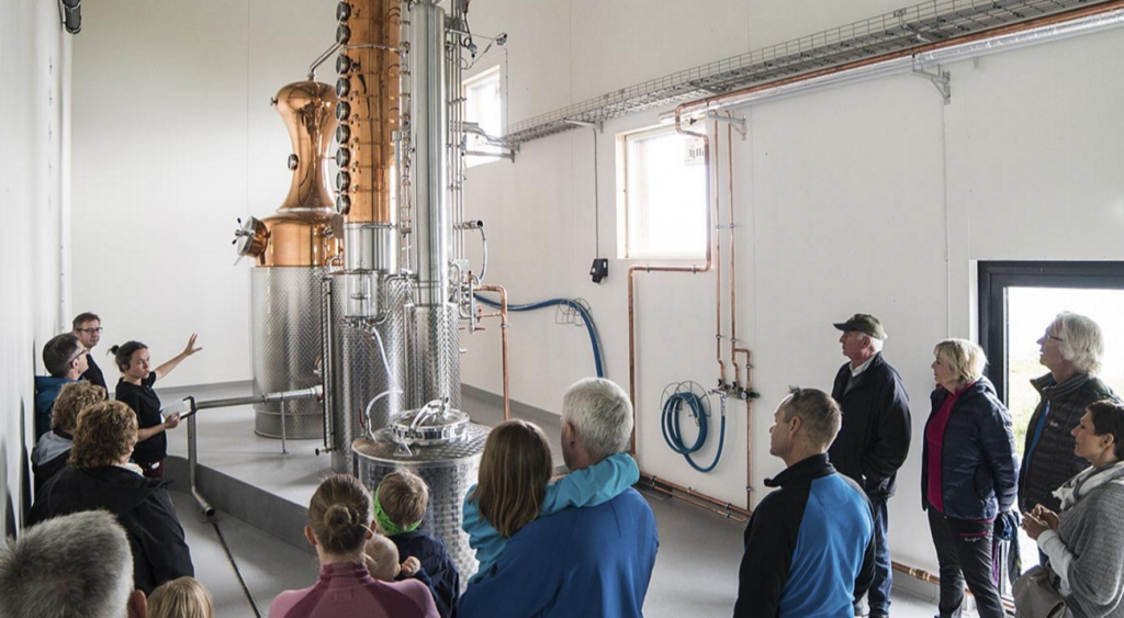 A tour underway at the new distillery.