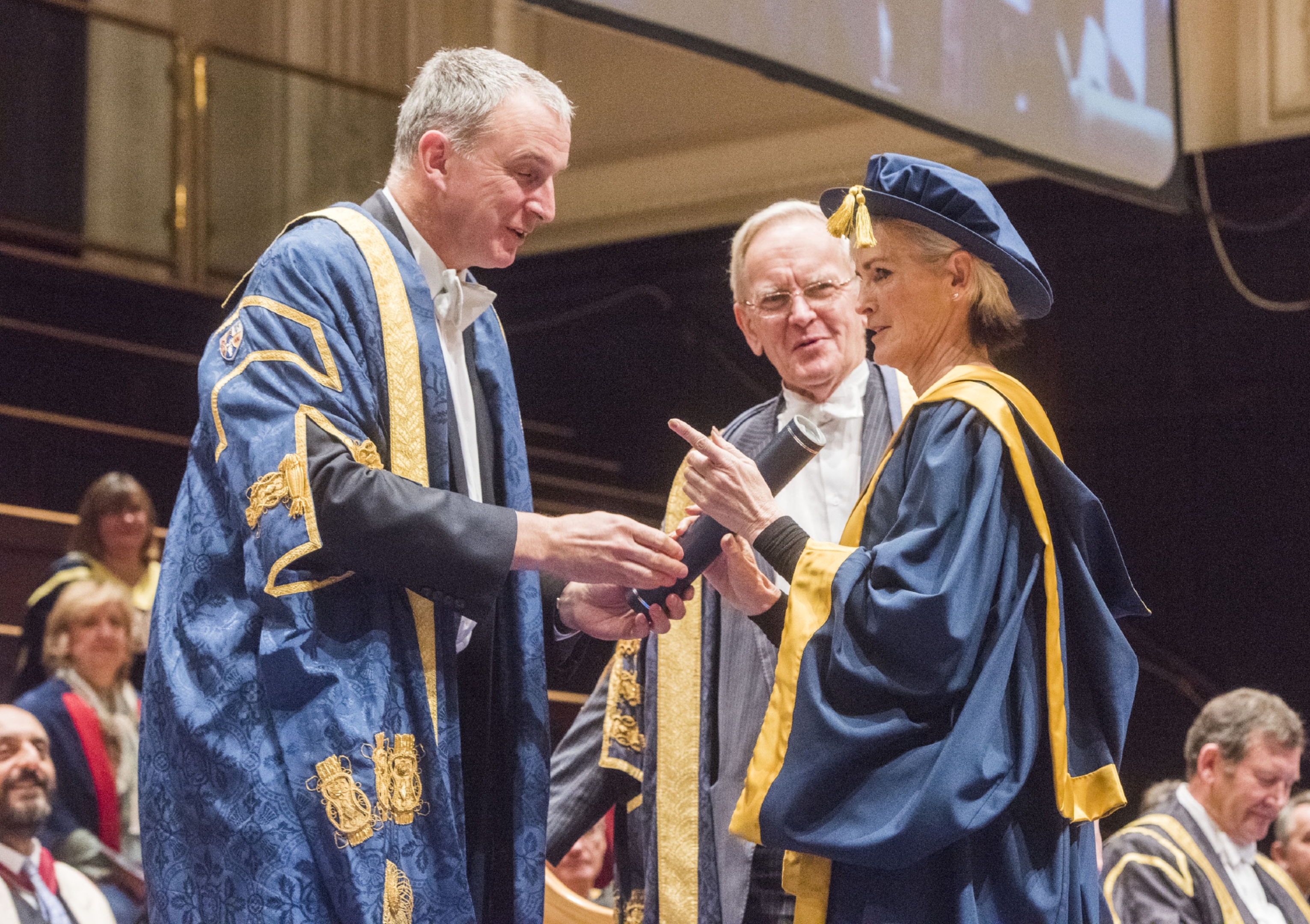 Abertay principal Nigel Seaton and Chancelor Lord Cullen present
Judy Murray with her honorary degree from Abertay University in Dundee