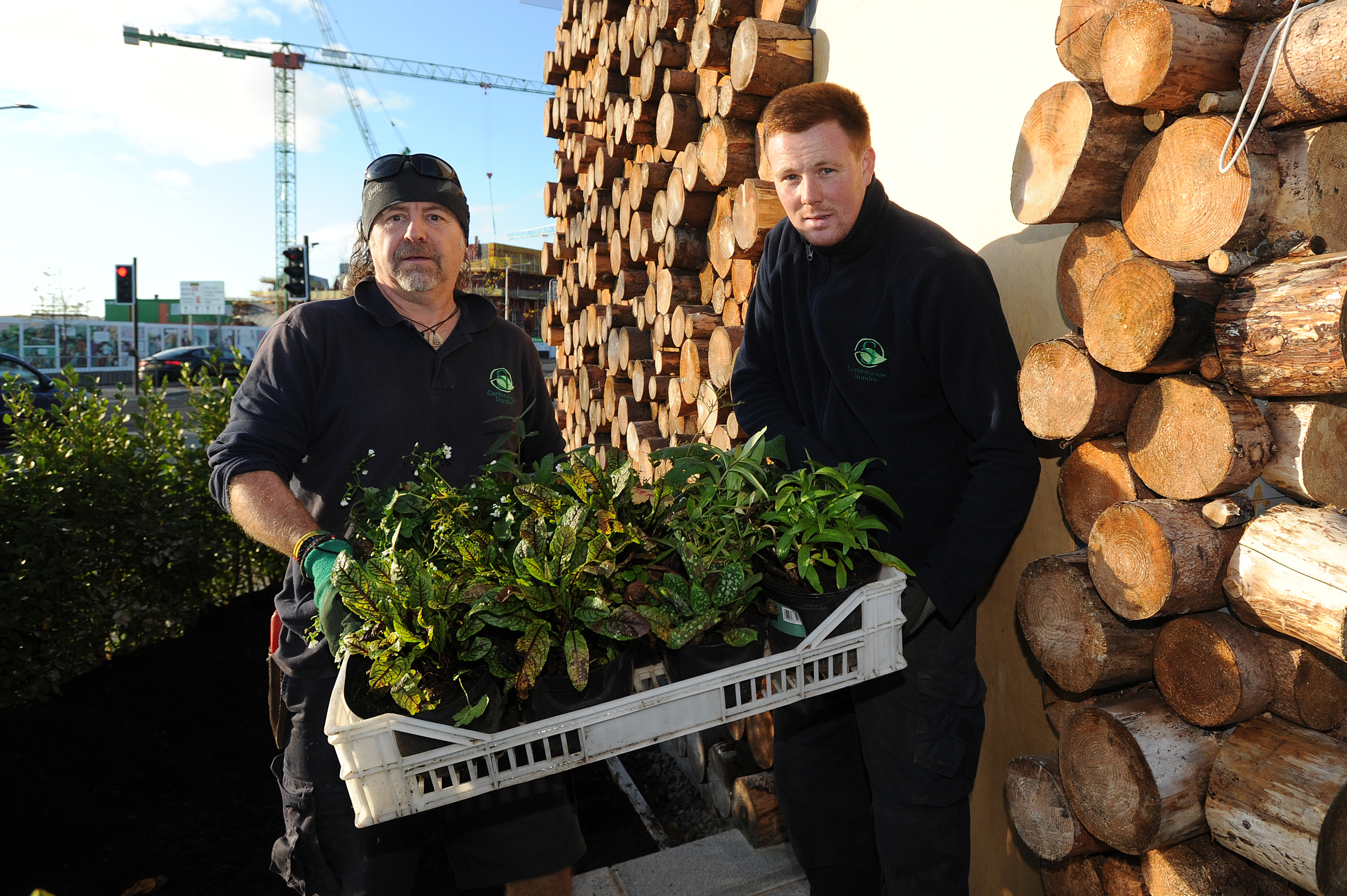 Paul Lawn, left, and Paul Gagin work in the pavilion gardens